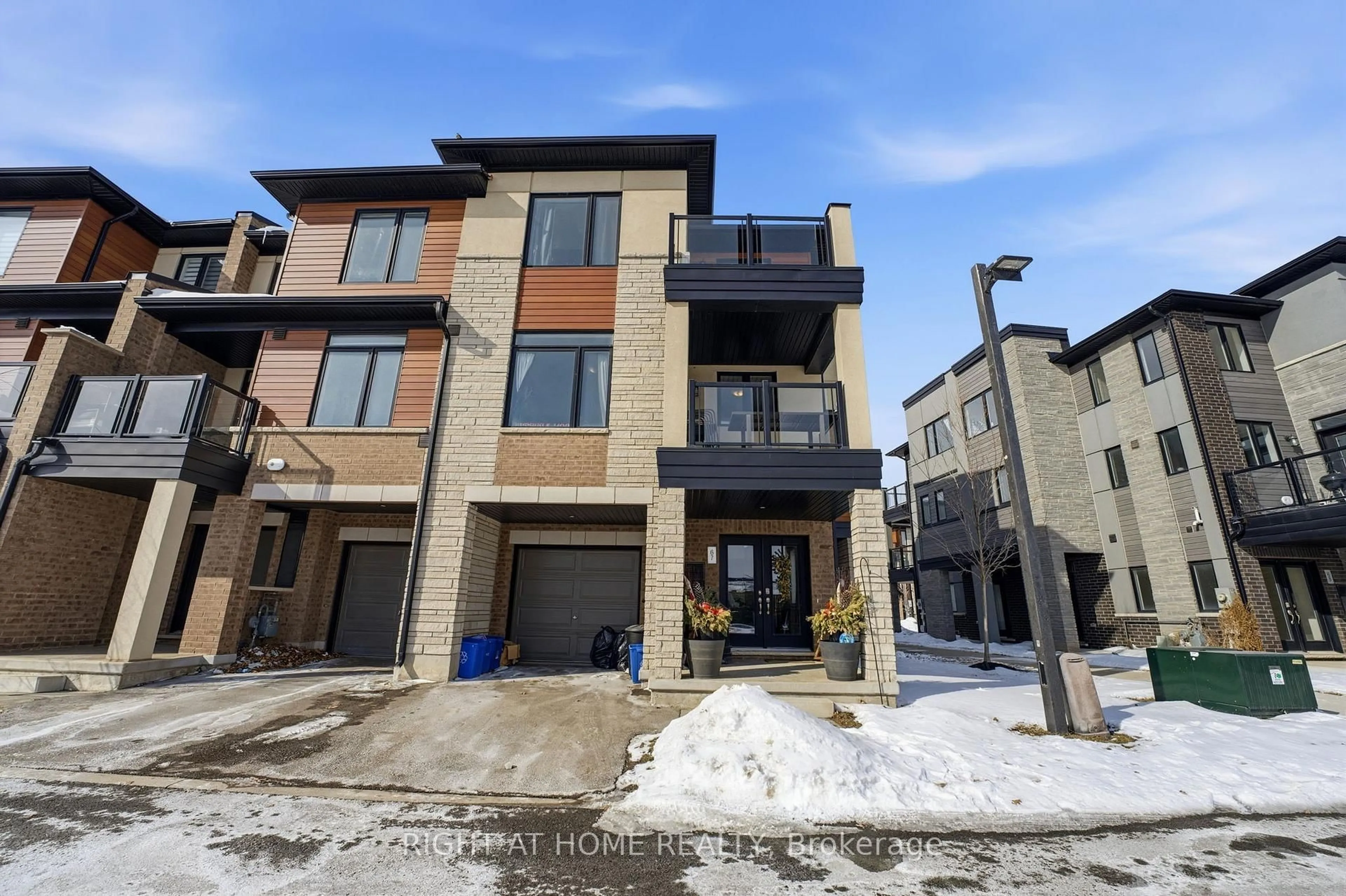 Home with brick exterior material, street for 590 North Service Rd #67, Hamilton Ontario L8E 0K5