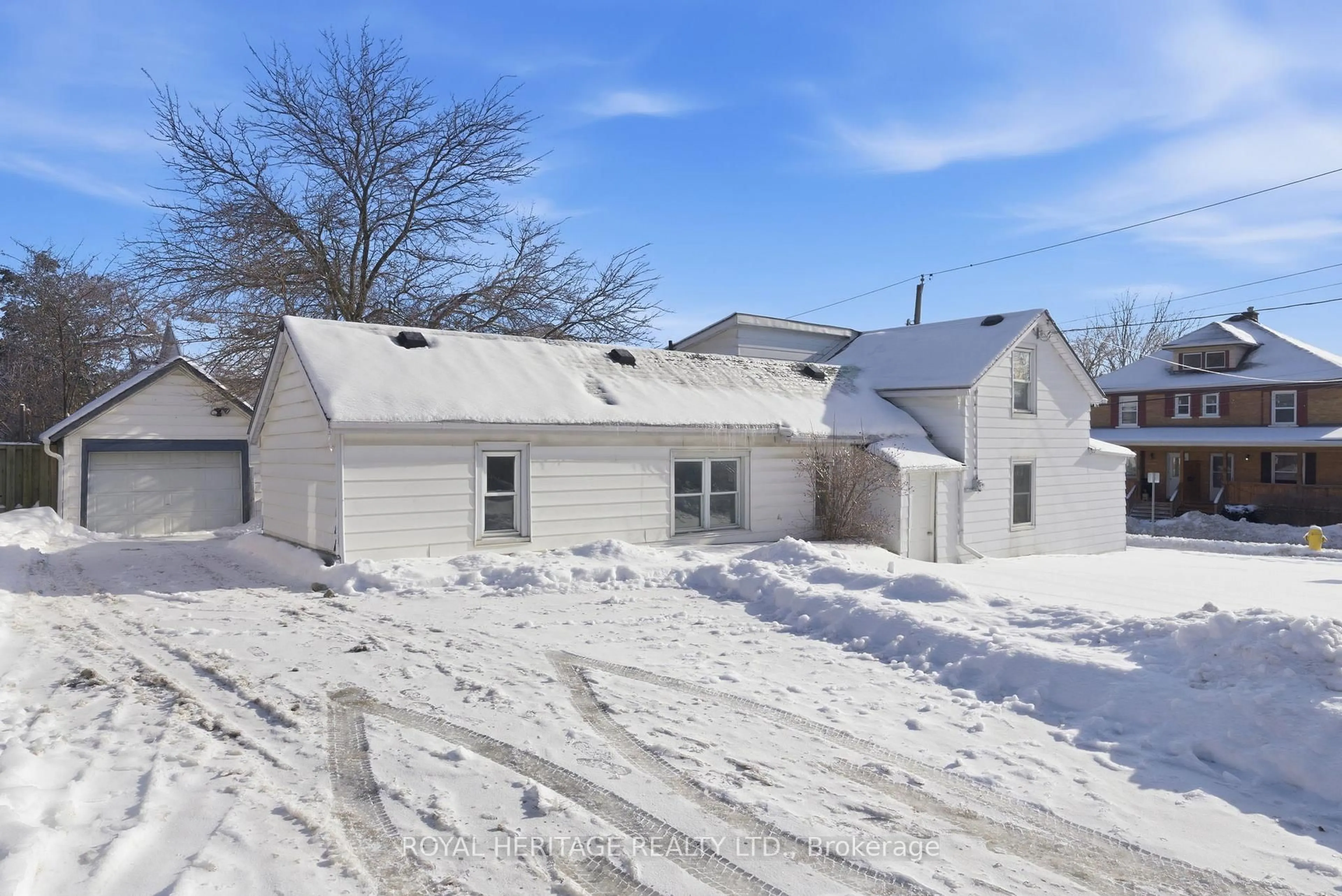 A pic from outside/outdoor area/front of a property/back of a property/a pic from drone, street for 18 Spring St, Quinte West Ontario K8V 3Y5