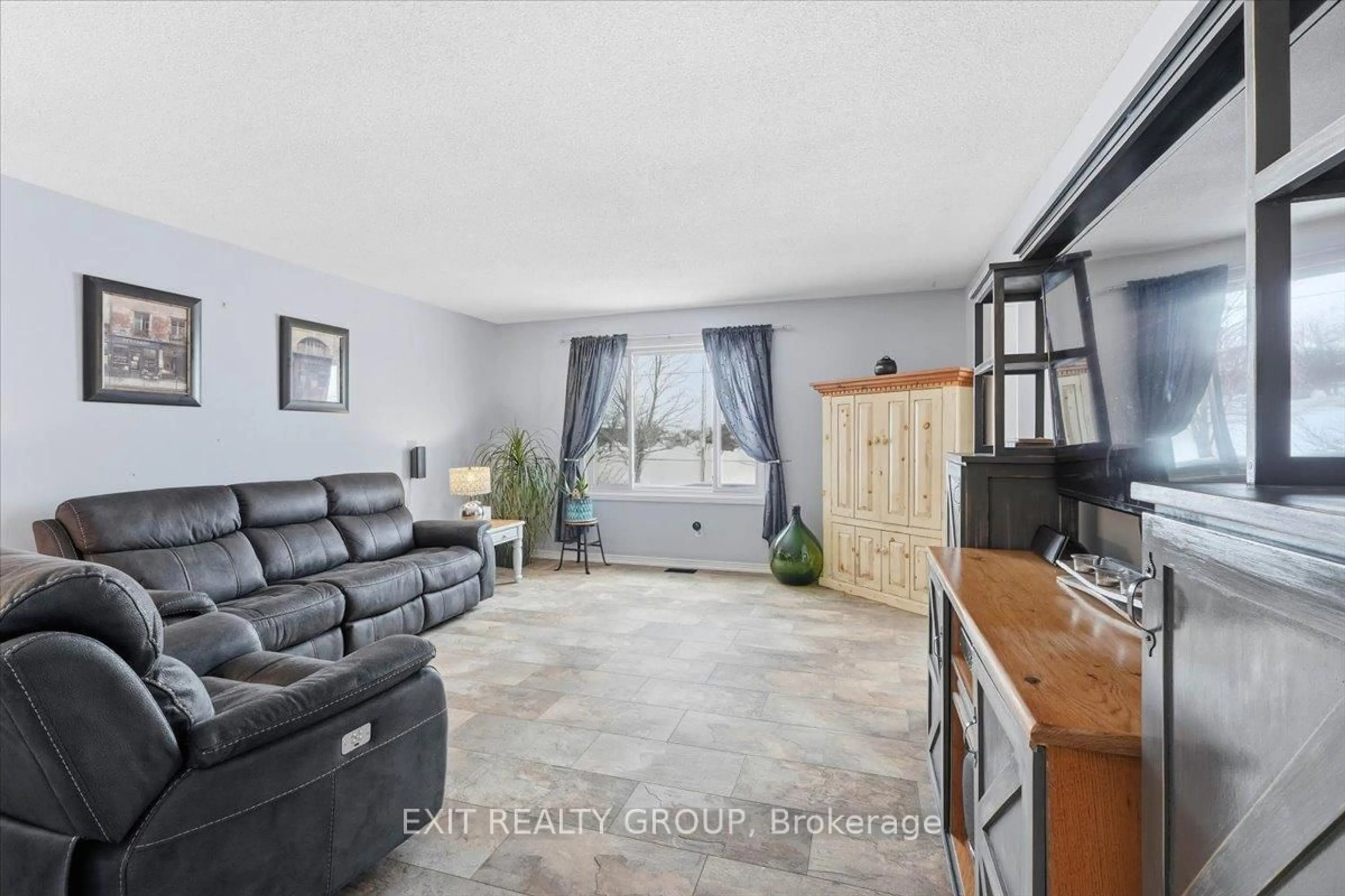 Living room with furniture, ceramic/tile floor for 2433 Highway 62, Prince Edward County Ontario K0K 1G0