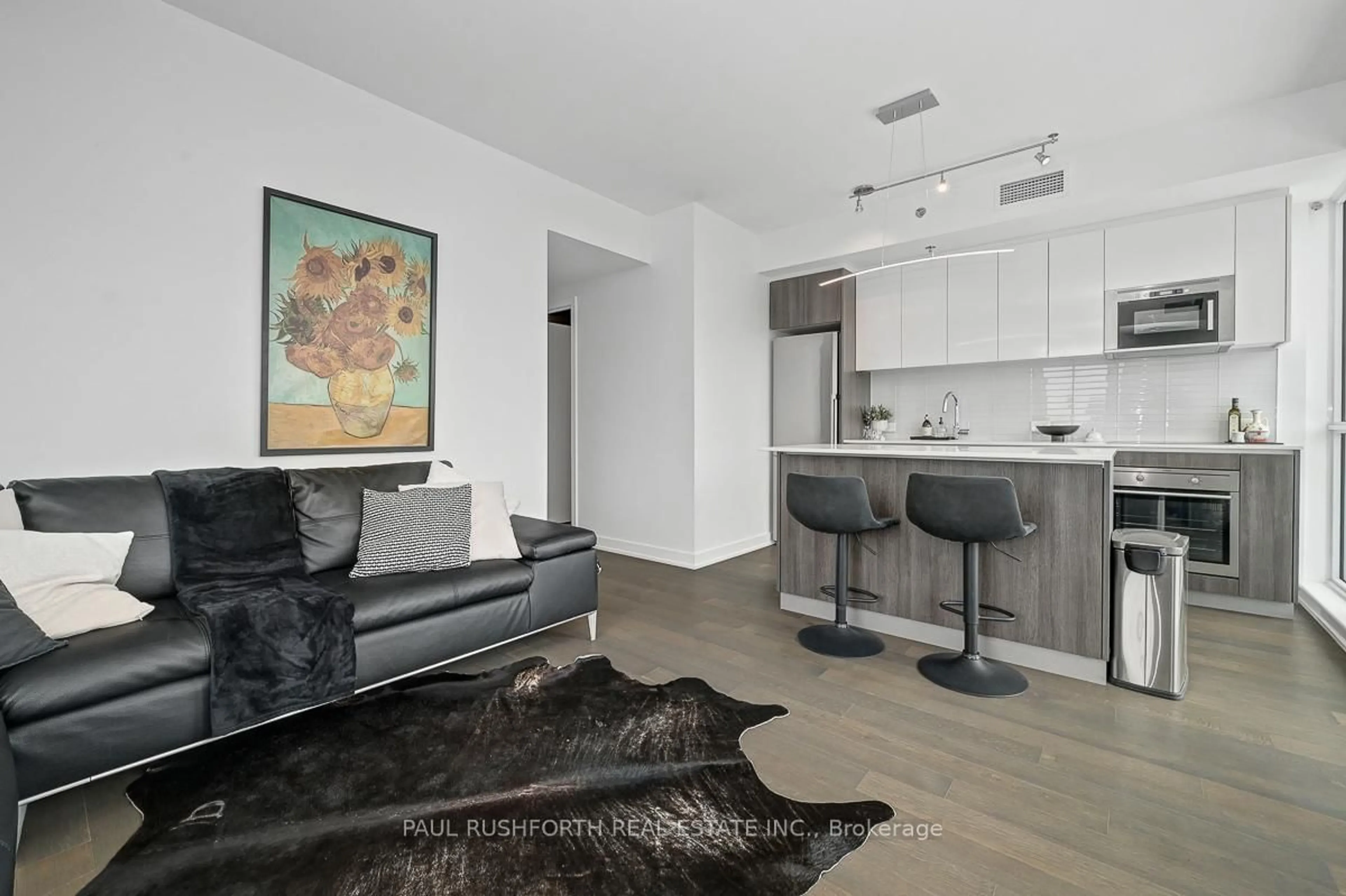 Living room with furniture, unknown for 199 Slater St #2017, Ottawa Ontario K1P 0A6