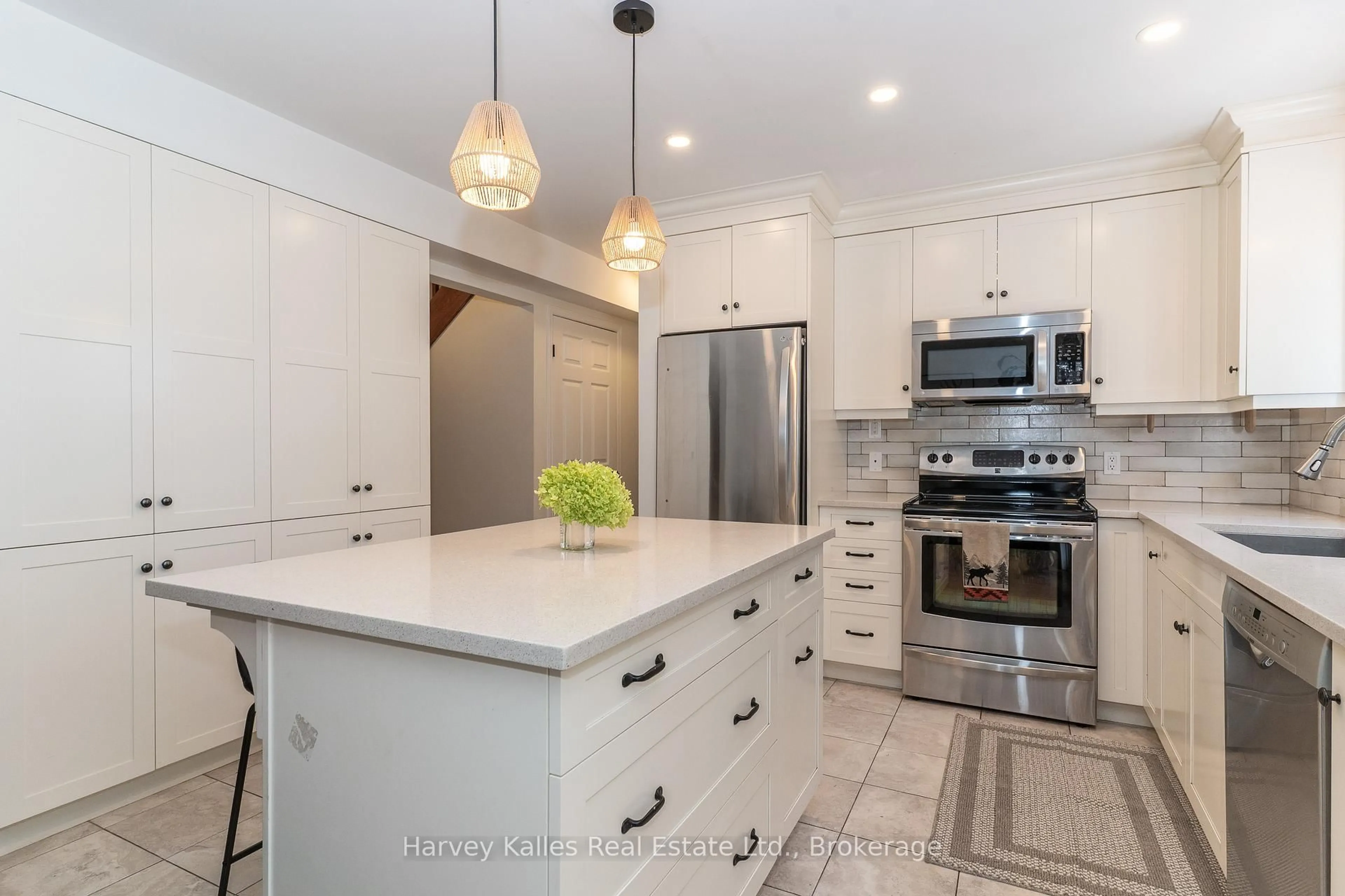 Open concept kitchen, ceramic/tile floor for 28 Queen St, Parry Sound Ontario P2A 2W3