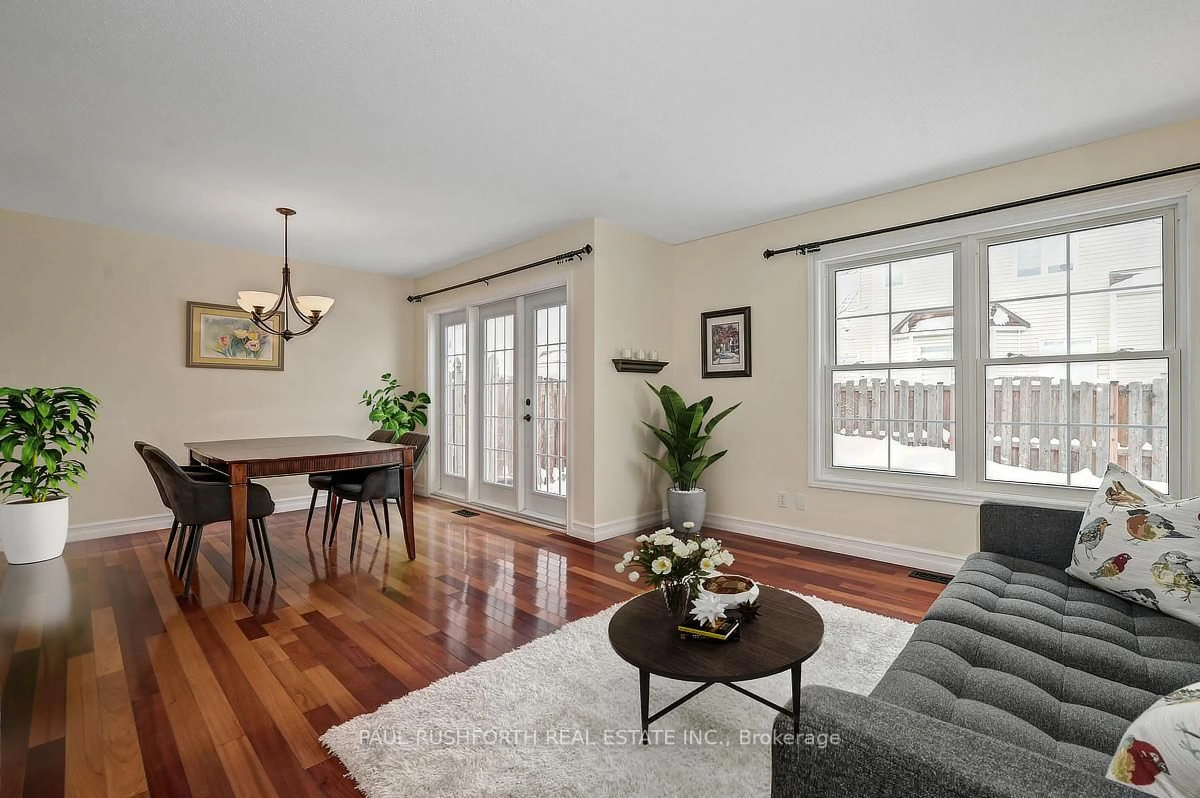 Living room with furniture, wood/laminate floor for 35 Stonepointe Ave, Ottawa Ontario K2G 6G4