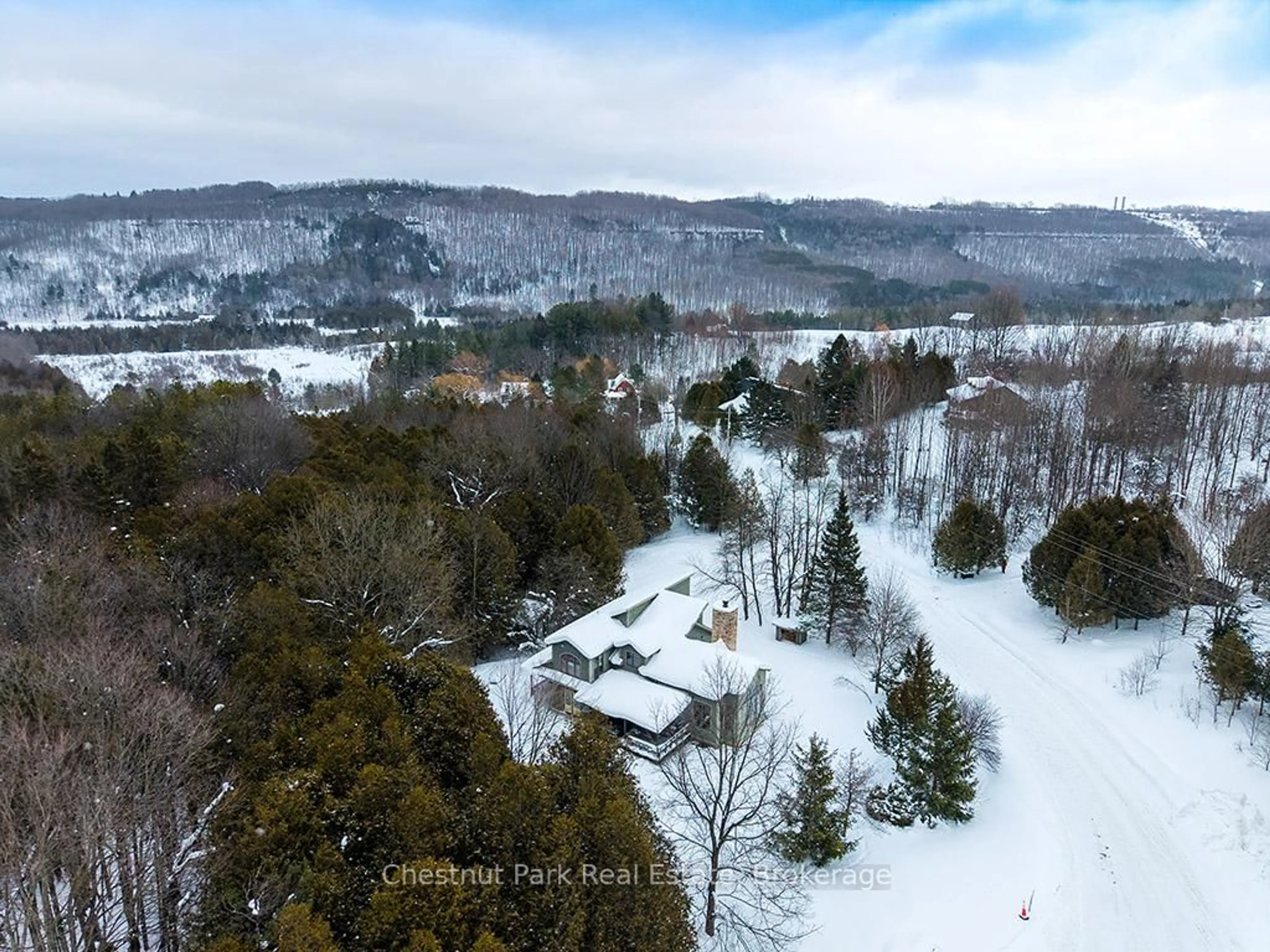 A pic from outside/outdoor area/front of a property/back of a property/a pic from drone, mountain view for 170 Mary B's Lane, Grey Highlands Ontario N0C 1H0