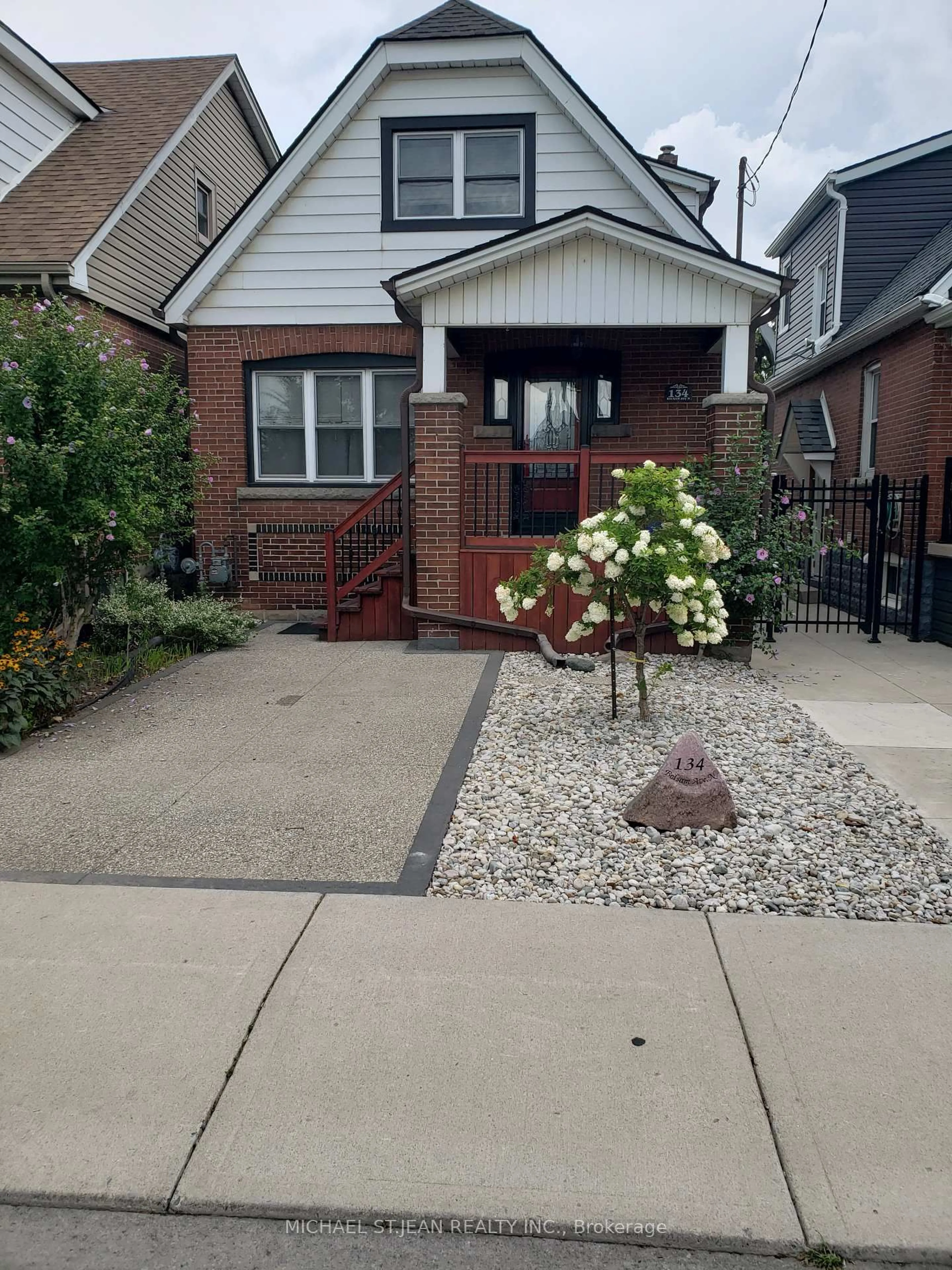 Home with brick exterior material, street for 134 Balsam Ave, Hamilton Ontario L8L 6Y3