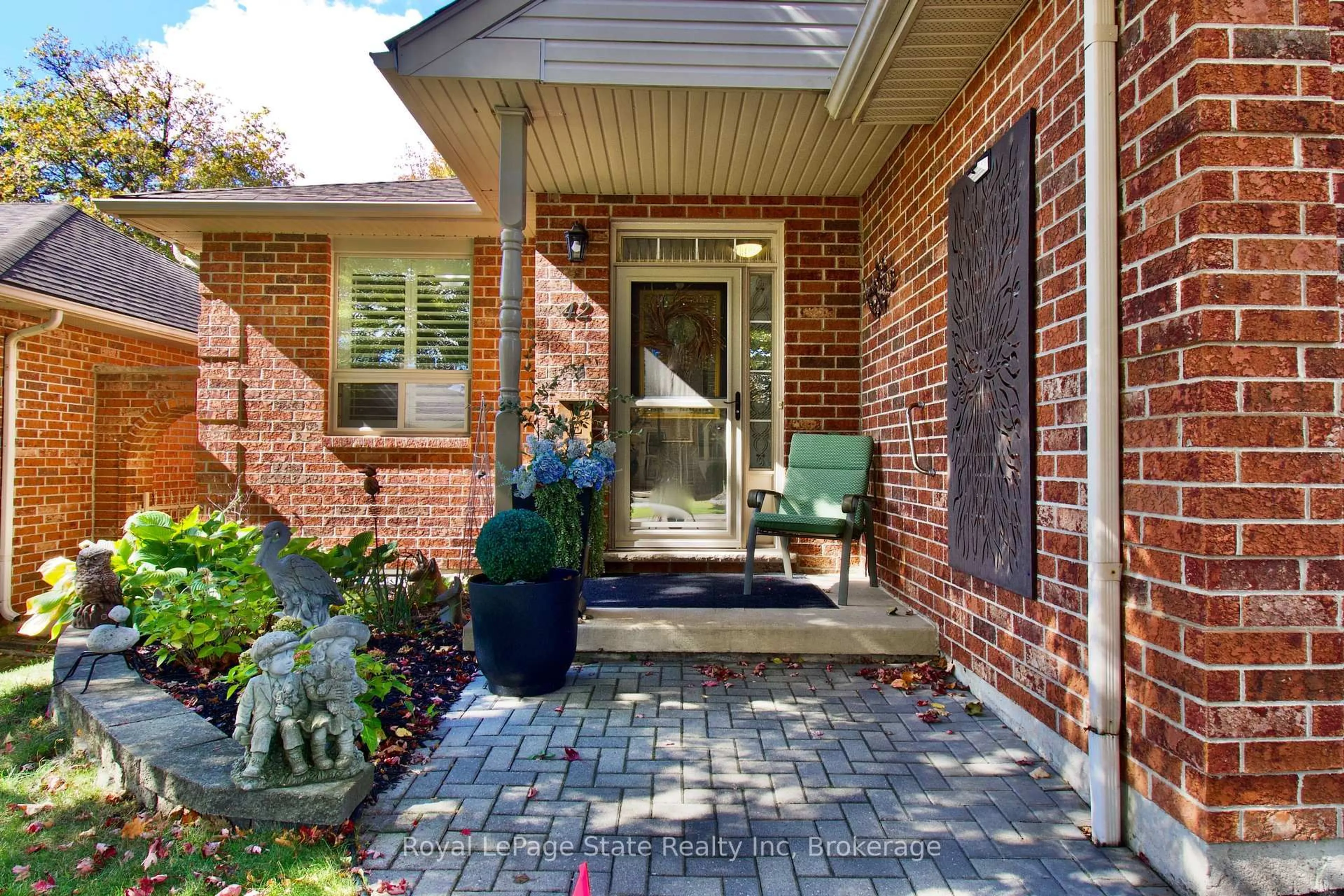 Home with brick exterior material, street for 42 Greentrail Dr, Hamilton Ontario L0R 1W0