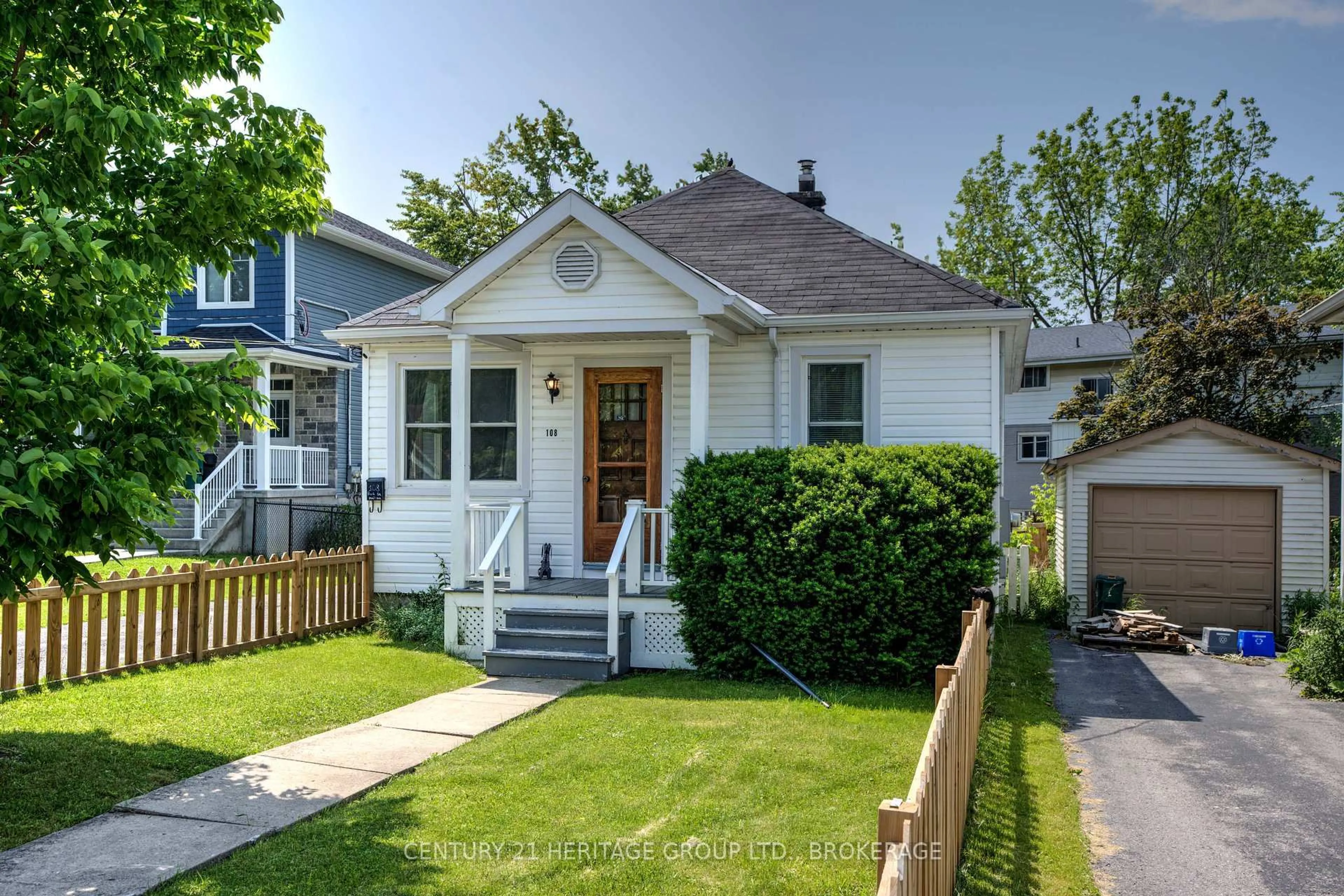 Home with vinyl exterior material, street for 108 Park St, Kingston Ontario K7L 1J8