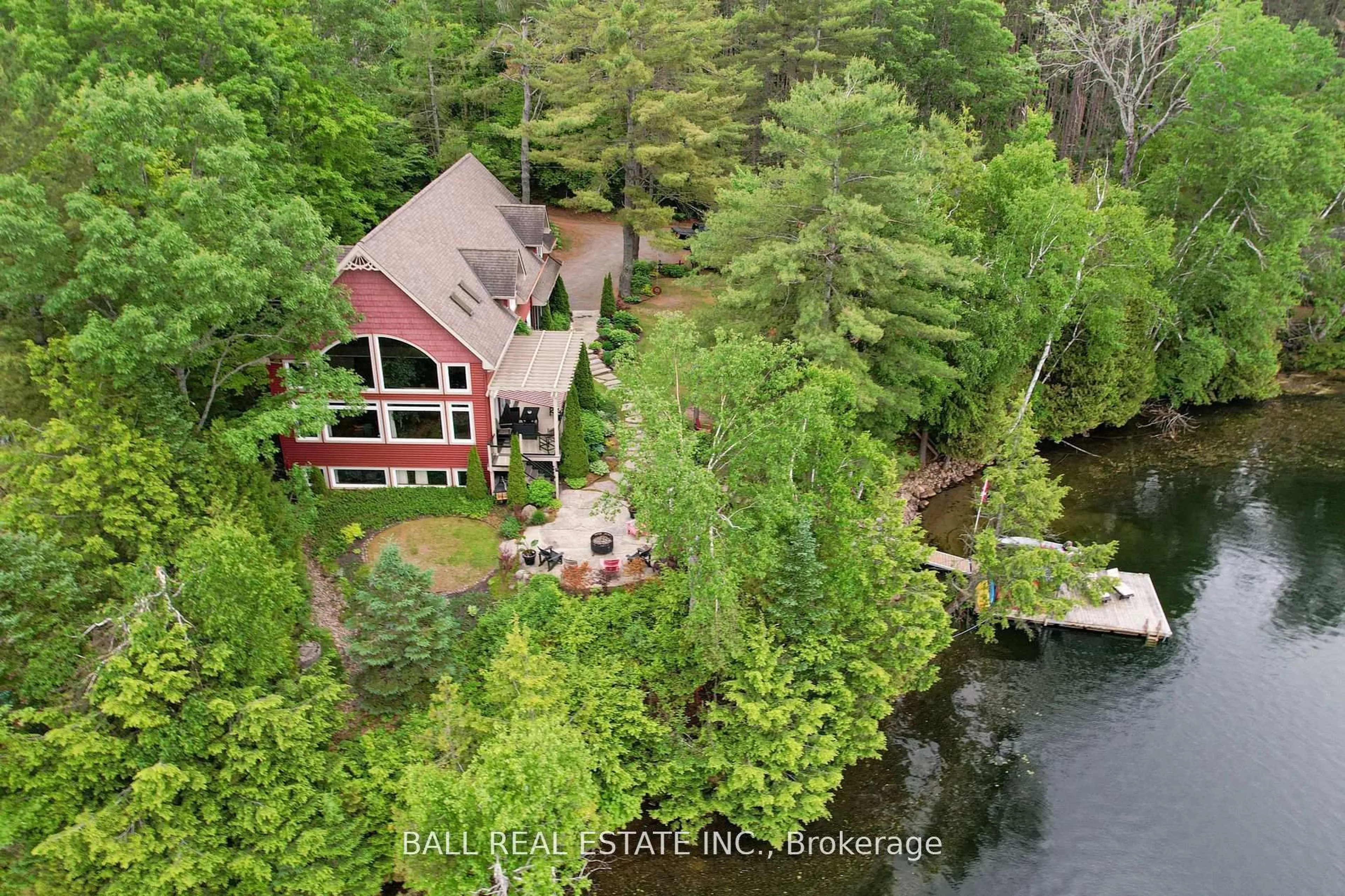 A pic from outside/outdoor area/front of a property/back of a property/a pic from drone, water/lake/river/ocean view for 32 Shadowood Lane, North Kawartha Ontario K0L 1A0
