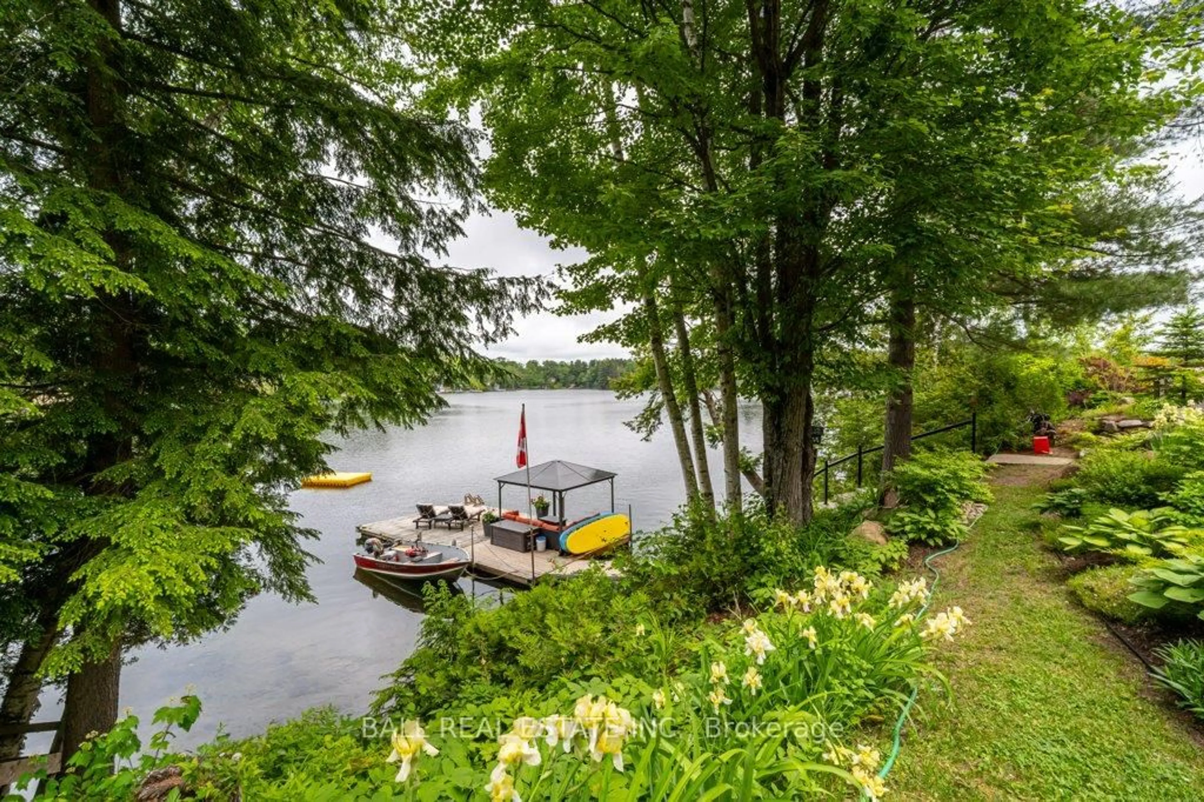 A pic from outside/outdoor area/front of a property/back of a property/a pic from drone, water/lake/river/ocean view for 32 Shadowood Lane, North Kawartha Ontario K0L 1A0