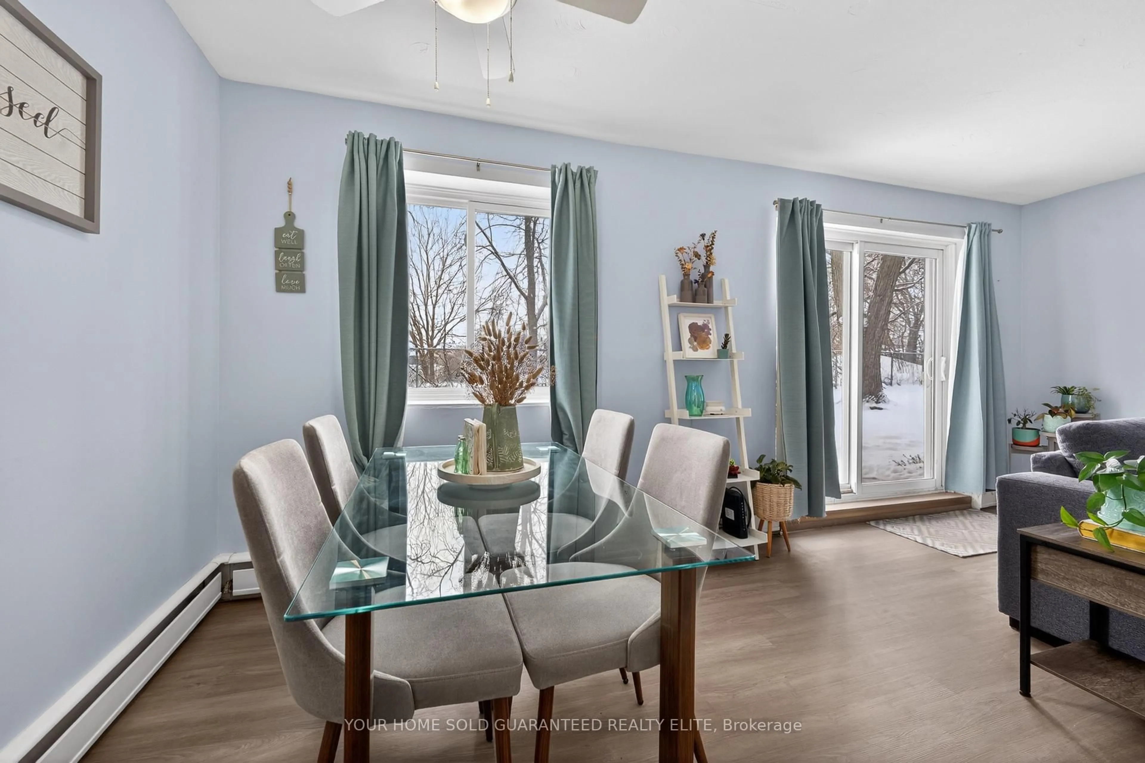 Dining room, wood/laminate floor for 456 Carlton St #10, St. Catharines Ontario L2M 4X1