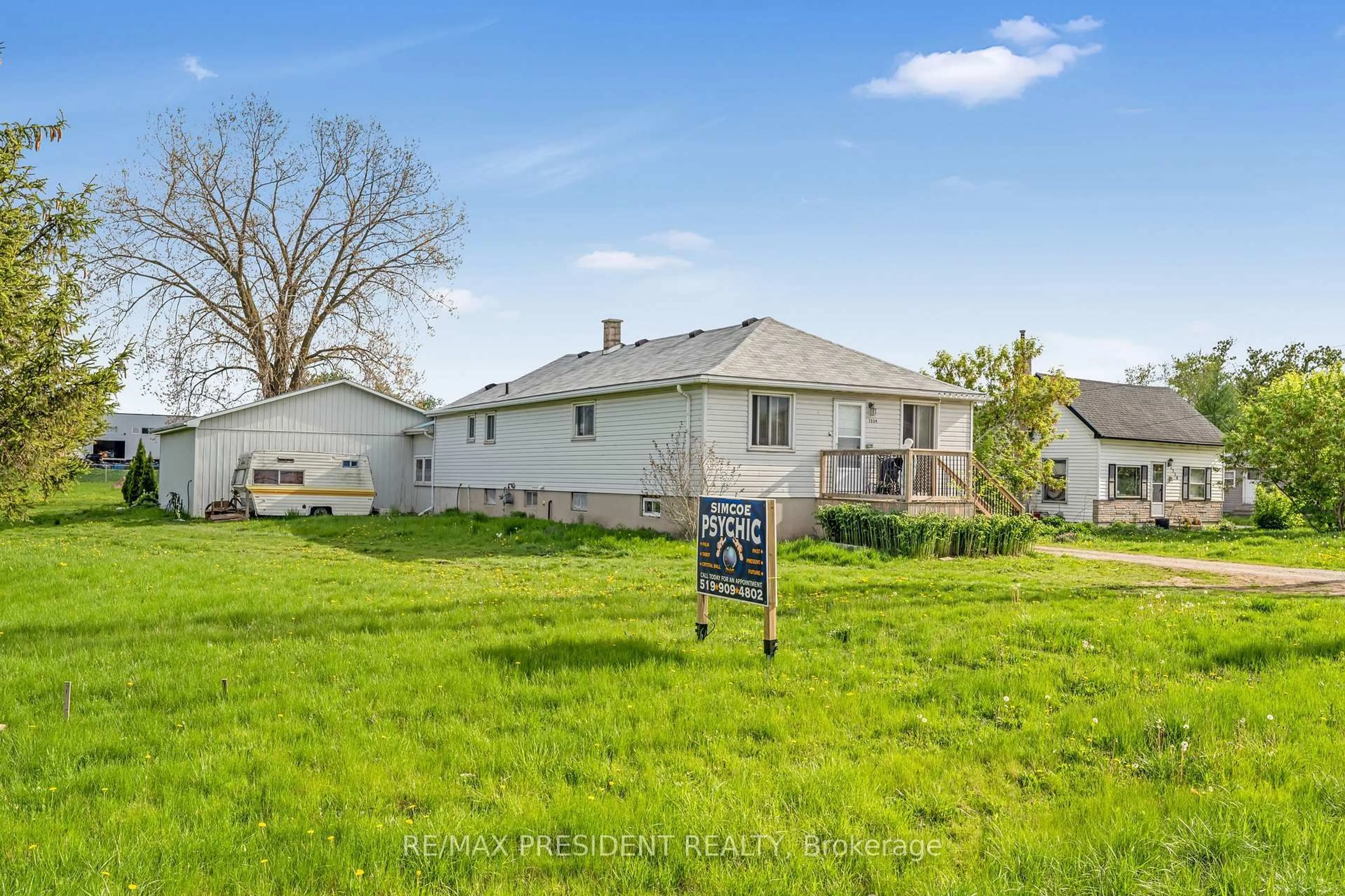 A pic from outside/outdoor area/front of a property/back of a property/a pic from drone, street for 1224 Parkinson Rd, Woodstock Ontario N4S 7W3