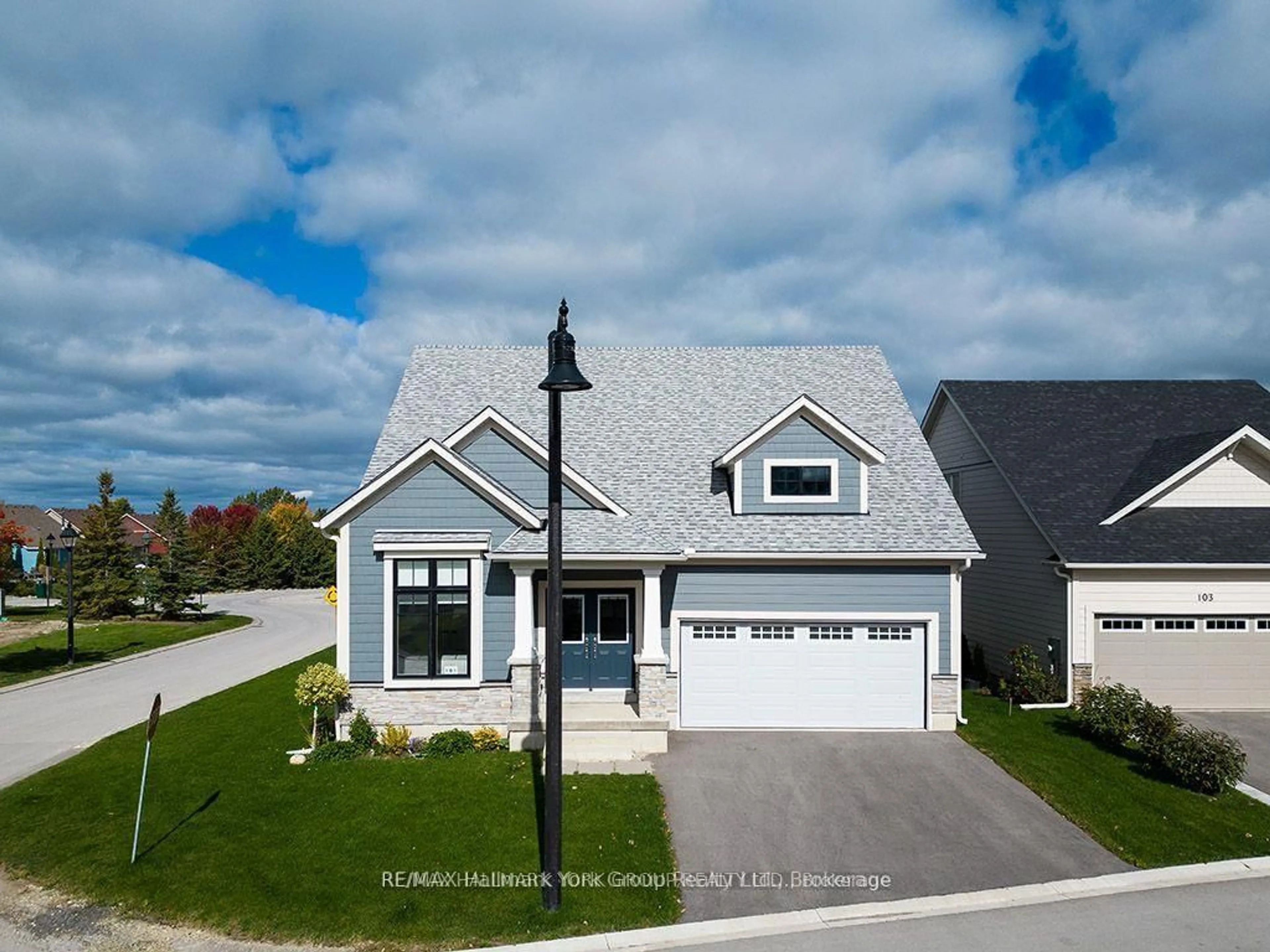A pic from outside/outdoor area/front of a property/back of a property/a pic from drone, street for 101 Clippers Lane, Blue Mountains Ontario N0H 2P0