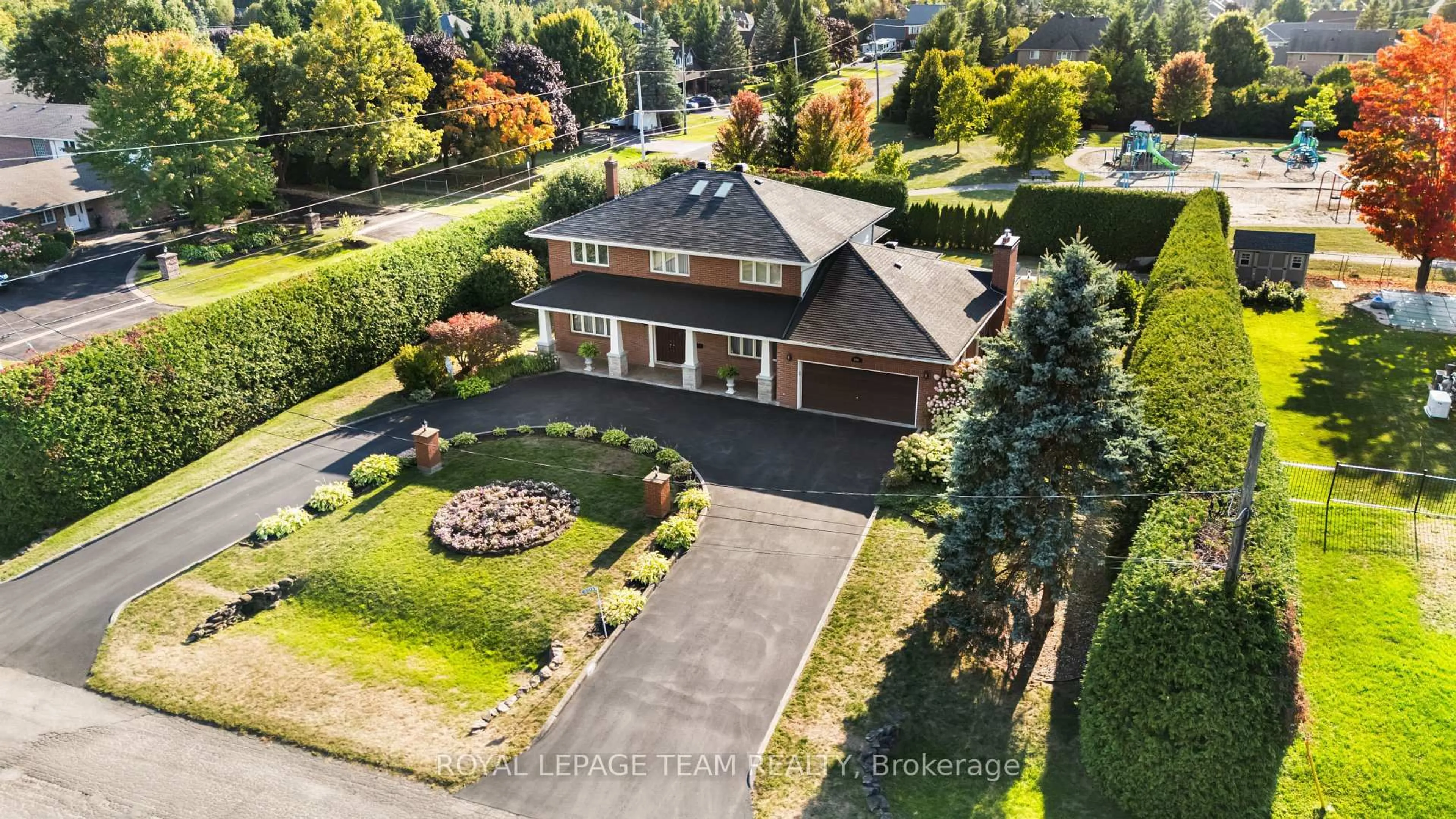 A pic from outside/outdoor area/front of a property/back of a property/a pic from drone, street for 6501 Wellwood St, Greely Ontario K4P 1G2