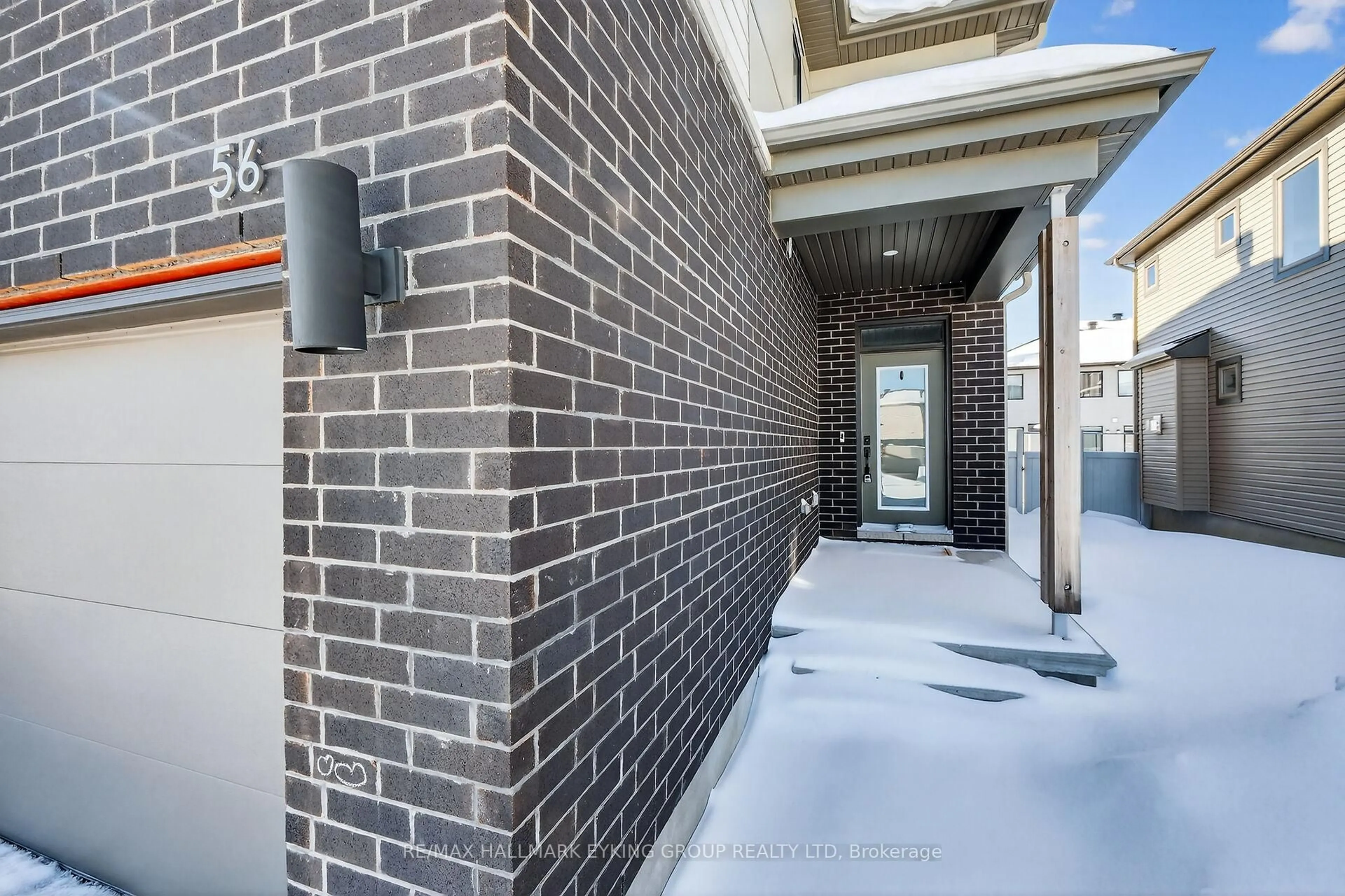 Home with brick exterior material, street for 56 Viceroy Mews, Ottawa Ontario K1X 0J5