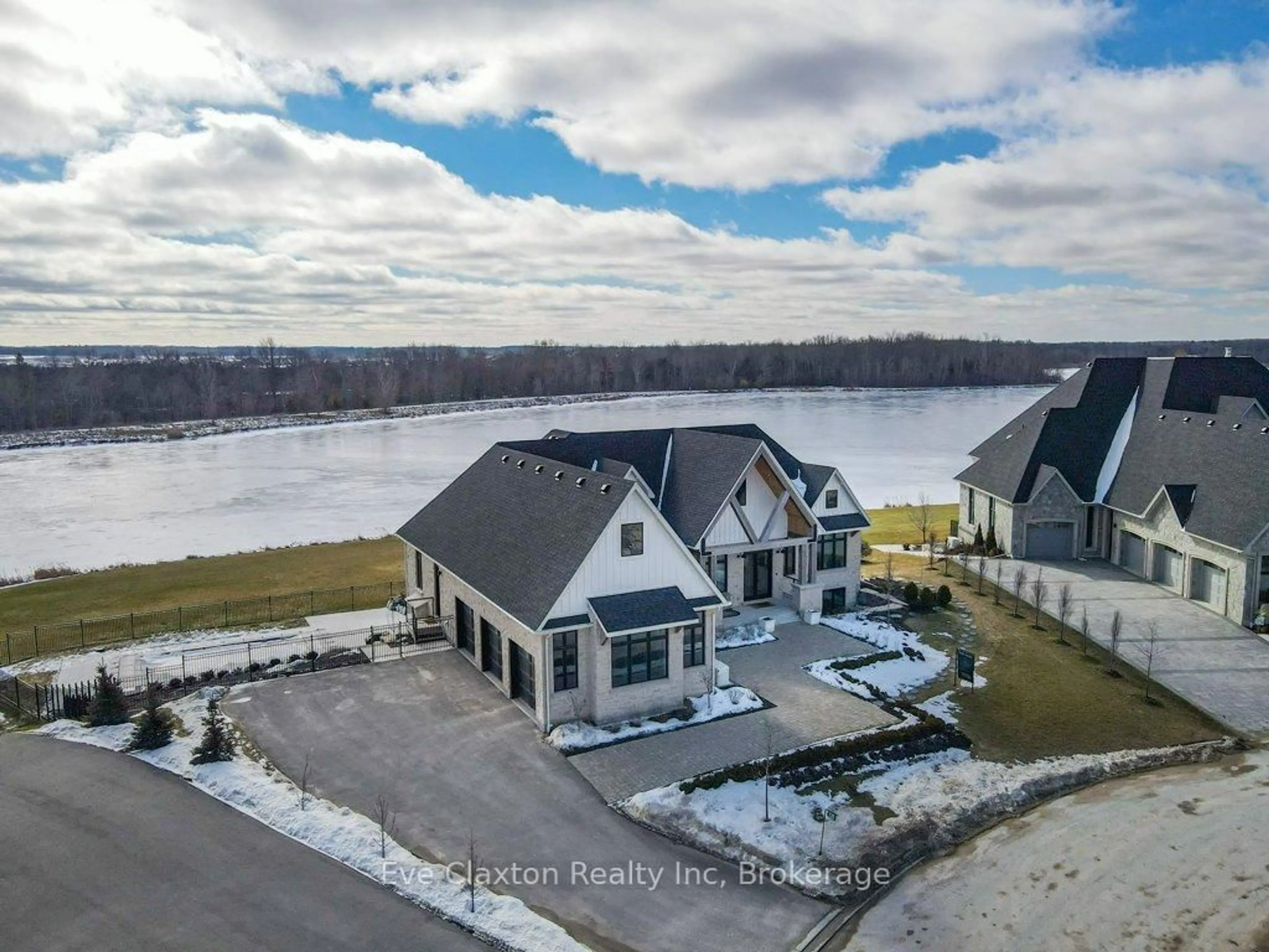 A pic from outside/outdoor area/front of a property/back of a property/a pic from drone, water/lake/river/ocean view for 129 Heritage Lake Dr, Puslinch Ontario N0B 2J0