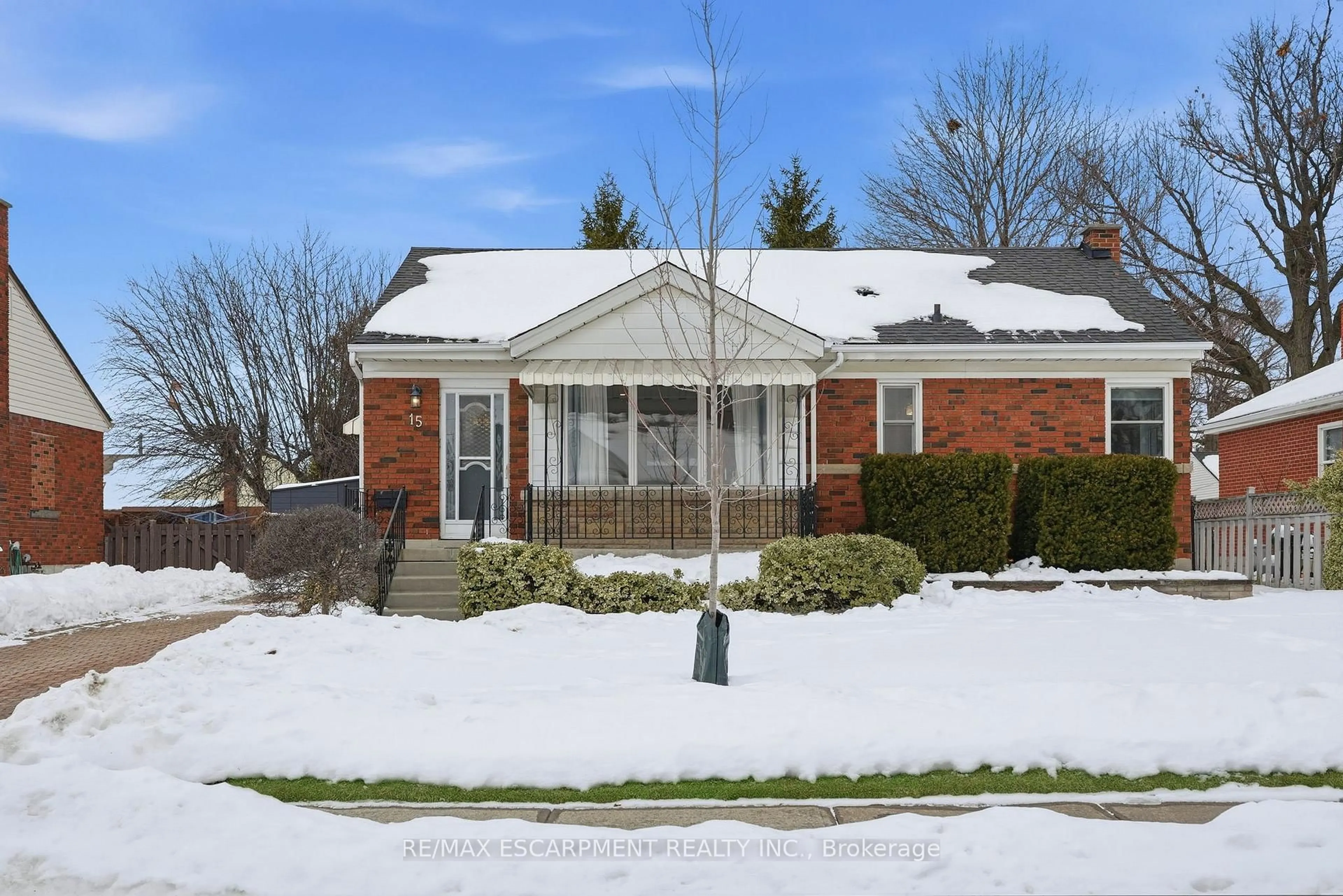 Home with brick exterior material, street for 15 Mulock Ave, Hamilton Ontario L8T 1H4