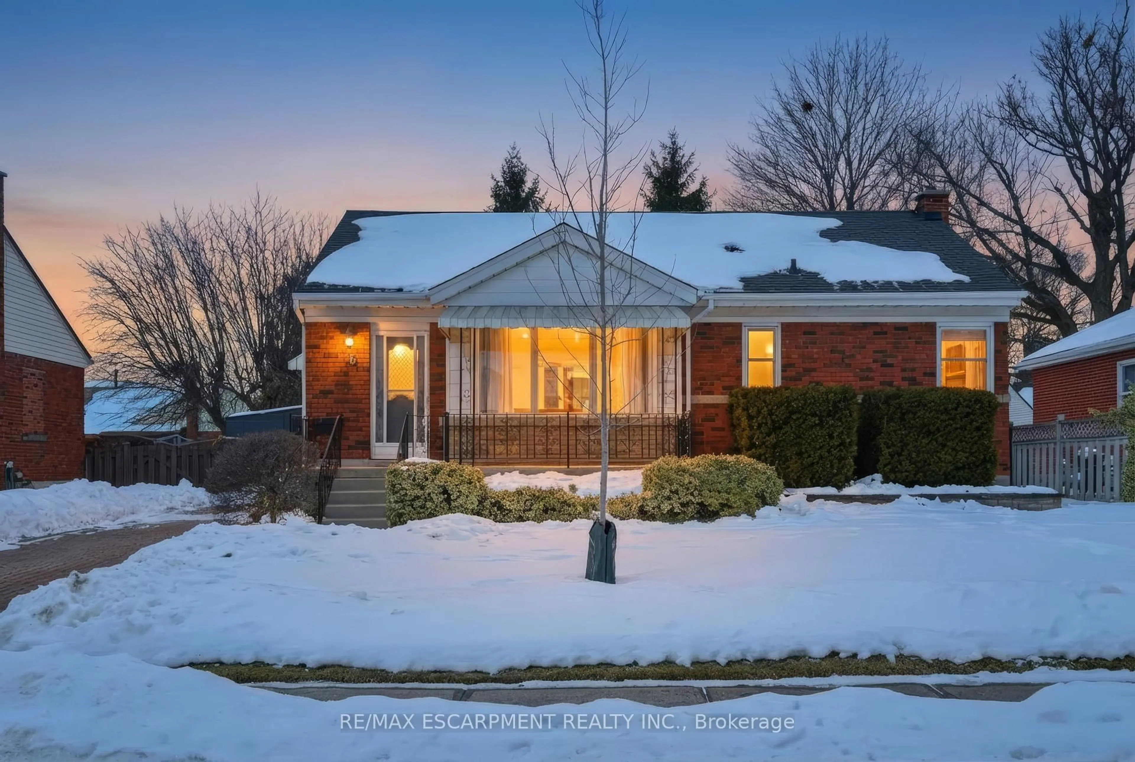 Home with brick exterior material, street for 15 Mulock Ave, Hamilton Ontario L8T 1H4