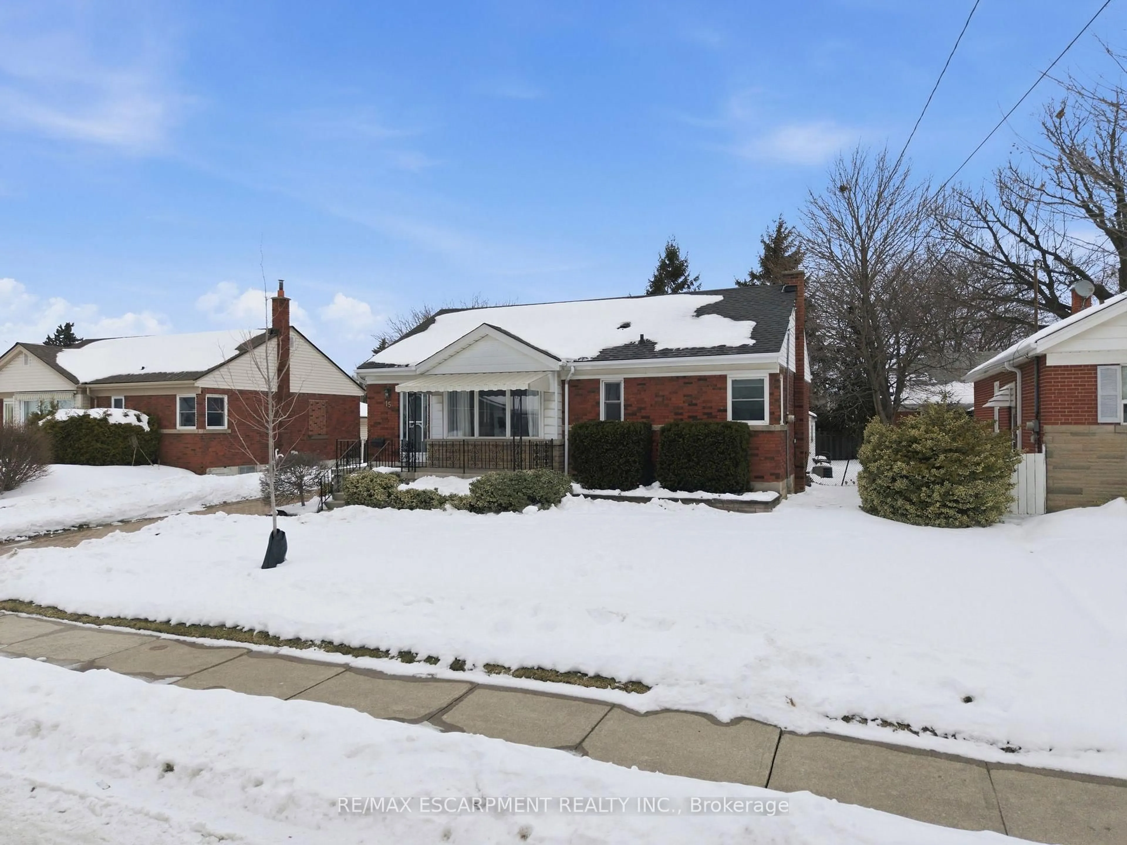 Home with brick exterior material, street for 15 Mulock Ave, Hamilton Ontario L8T 1H4