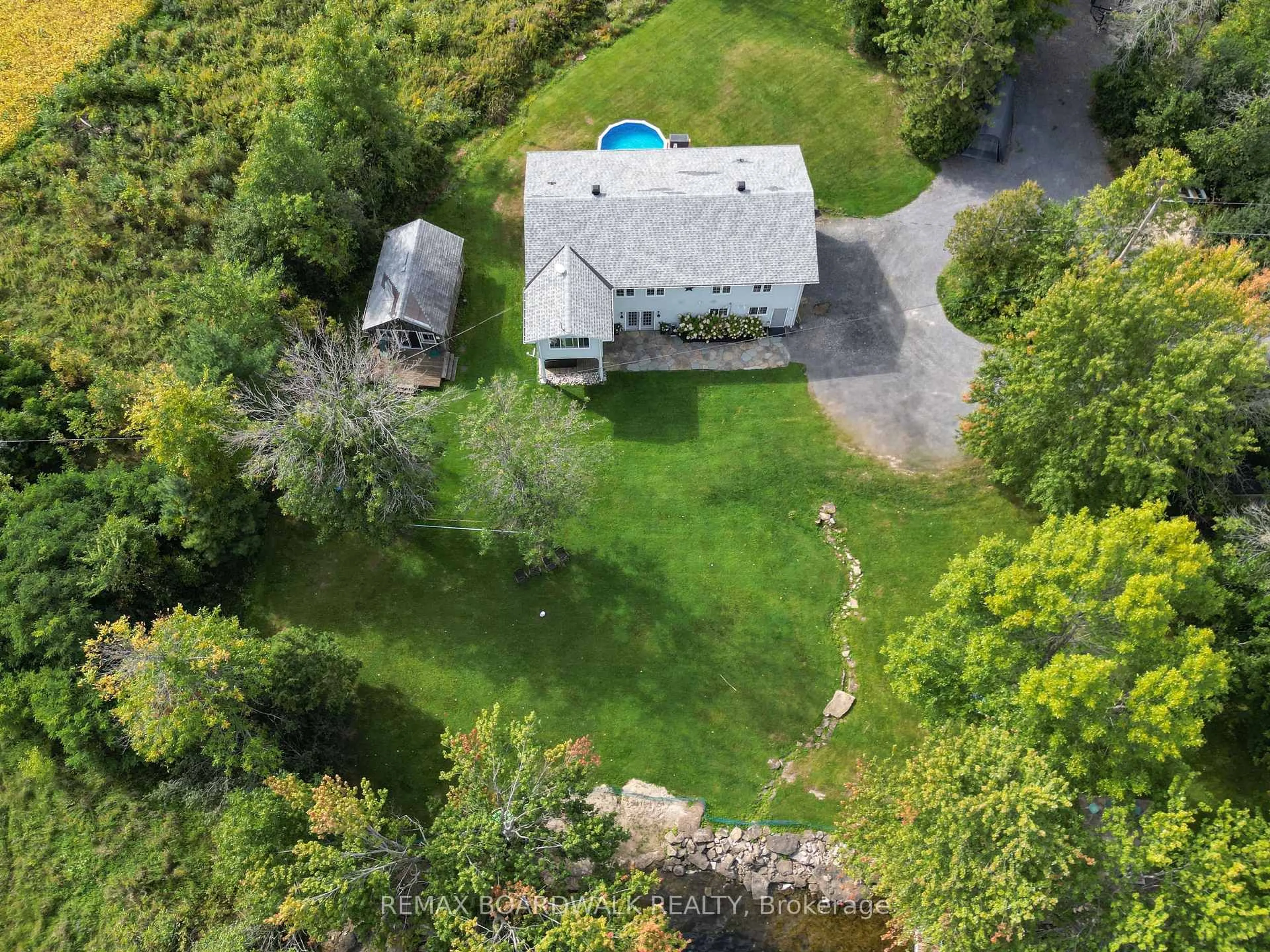 A pic from outside/outdoor area/front of a property/back of a property/a pic from drone, unknown for 100 Mcculloughs Landing, Perth Ontario K7H 3C8