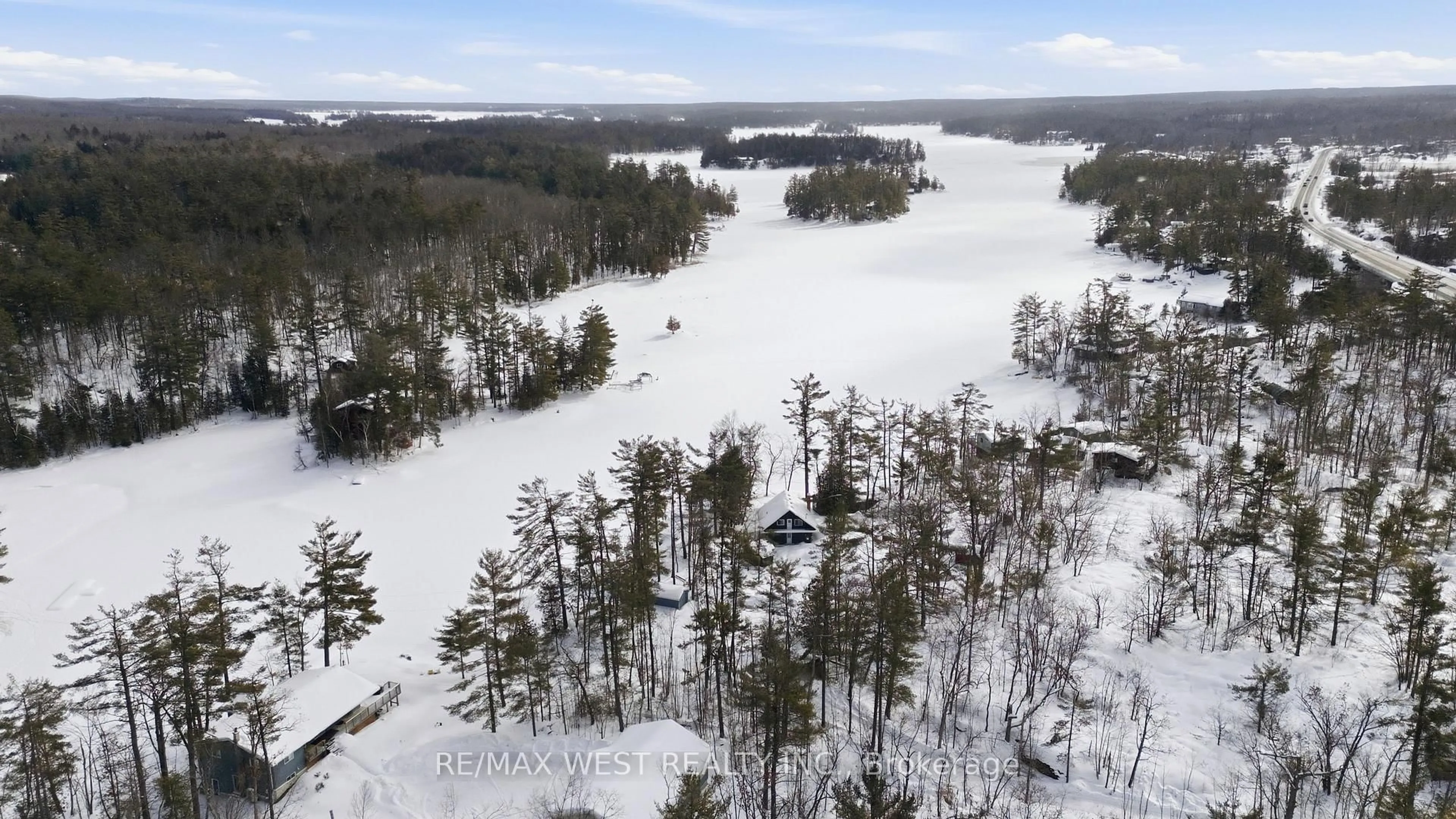 A pic from outside/outdoor area/front of a property/back of a property/a pic from drone, water/lake/river/ocean view for 2 Fire Route 2, Trent Lakes Ontario K0L 1J0