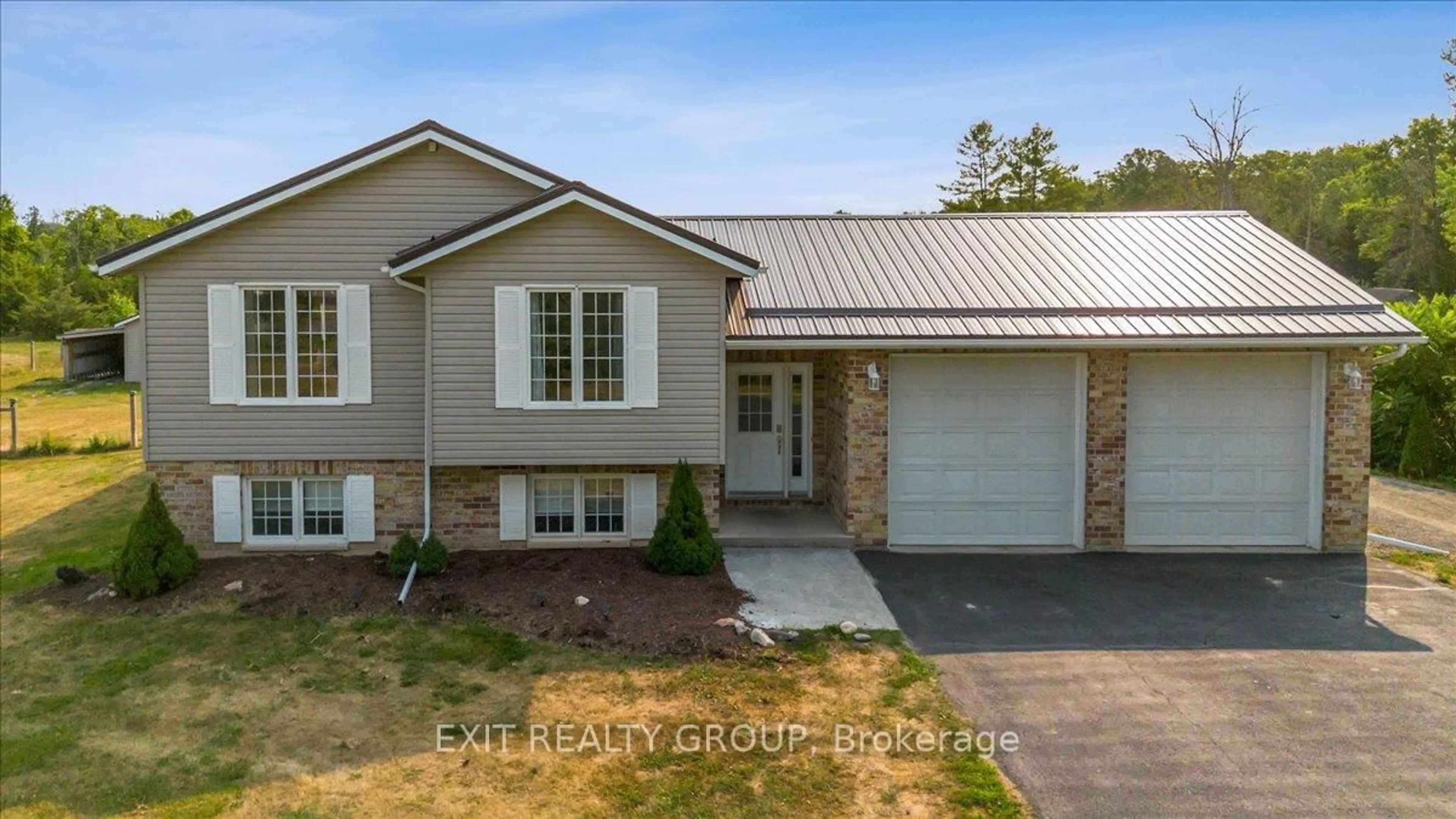 Home with vinyl exterior material, street for 323 Mapleview Rd, Hastings Ontario K0K 2C0