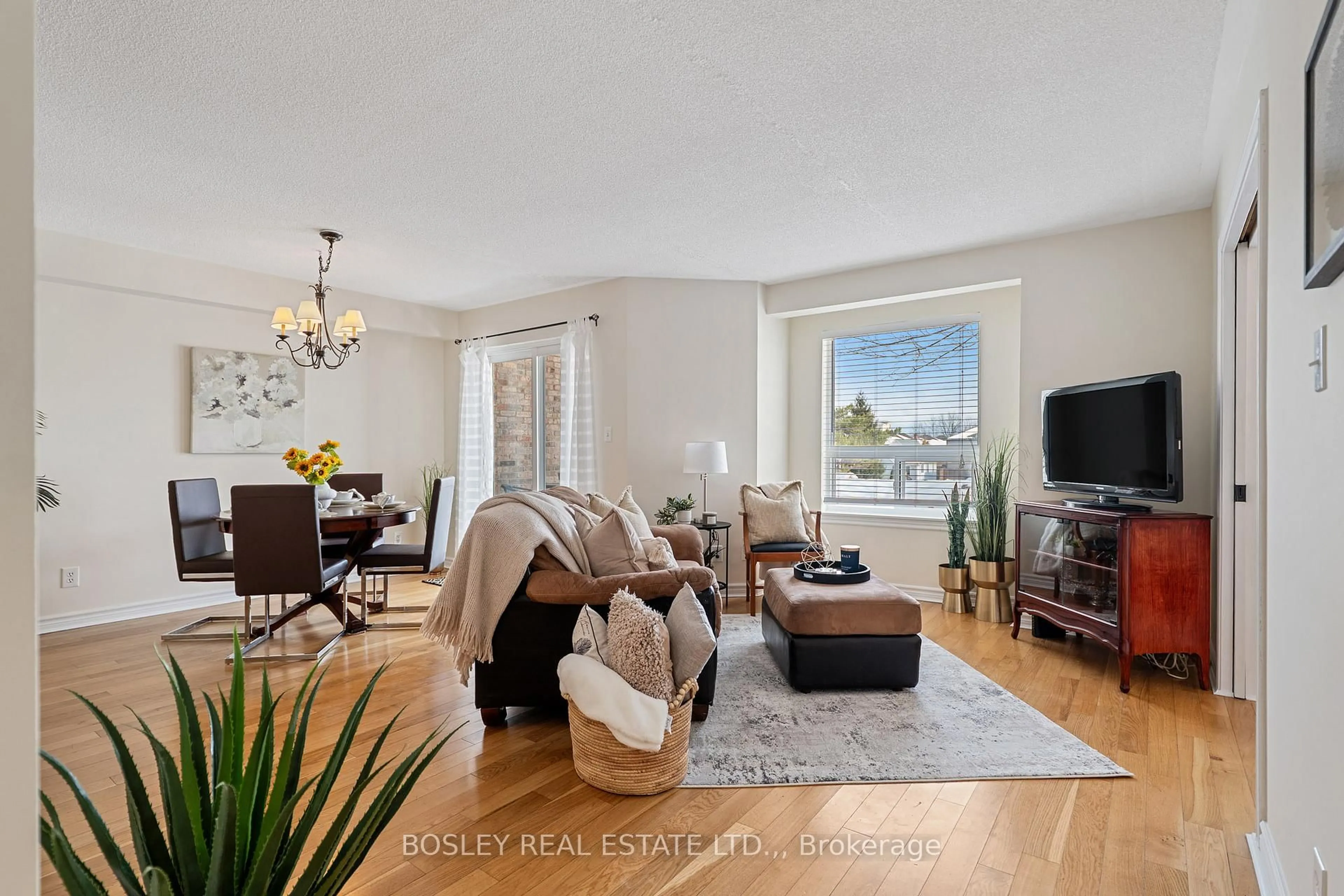 Living room with furniture, unknown for 1061 Vansickle Rd #205A, St. Catharines Ontario L2S 2X4