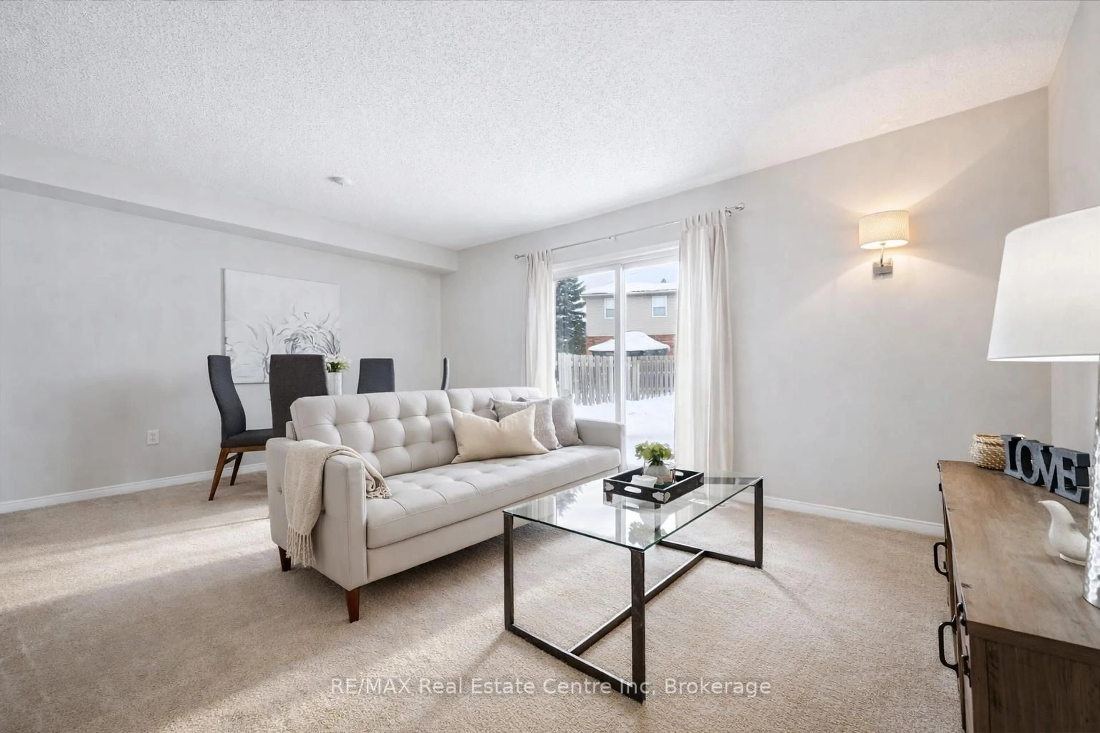 Living room with furniture, unknown for 30 IMPERIAL Rd #106, Guelph Ontario N1K 1Y1