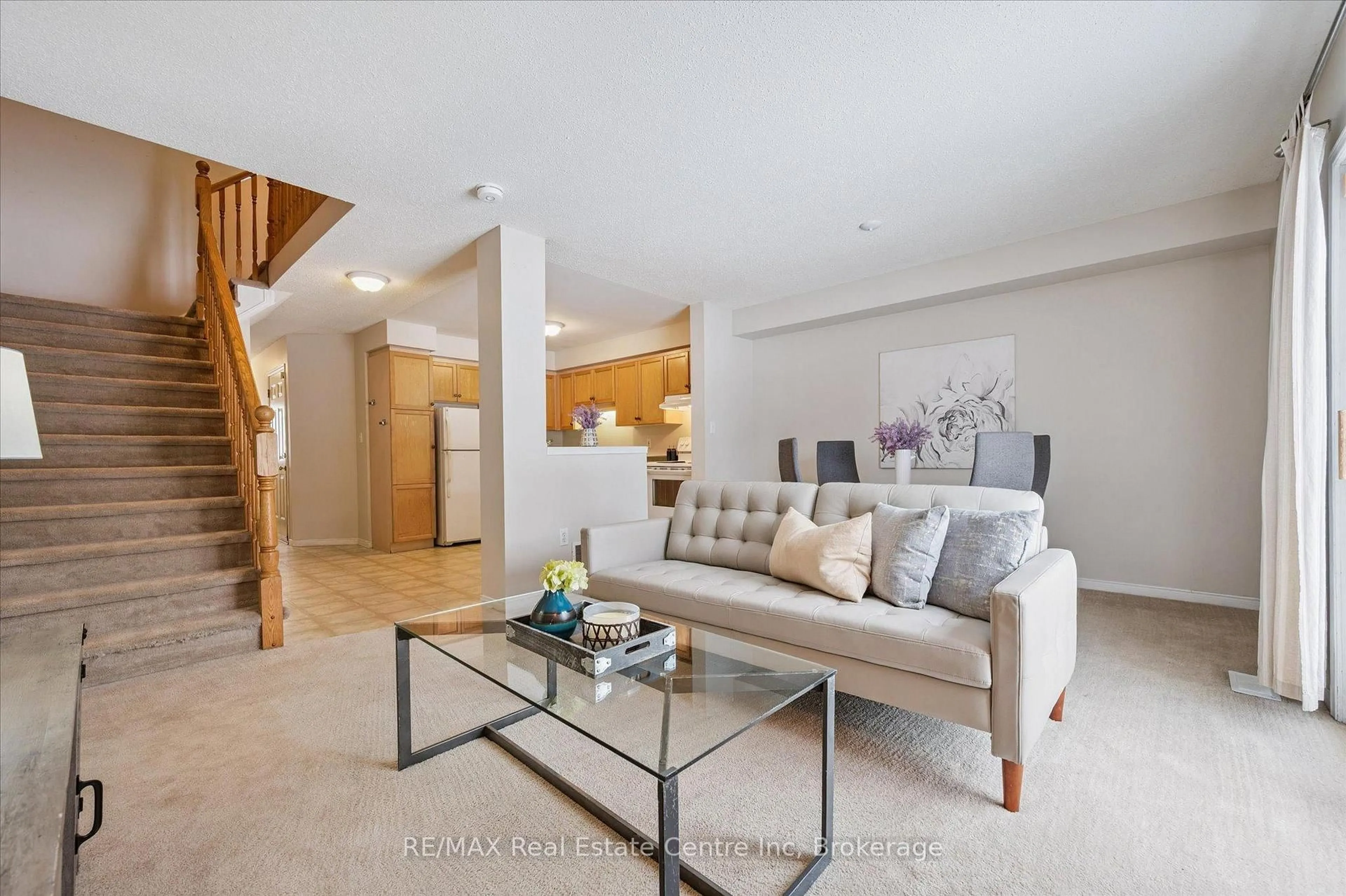 Living room with furniture, unknown for 30 IMPERIAL Rd #106, Guelph Ontario N1K 1Y1