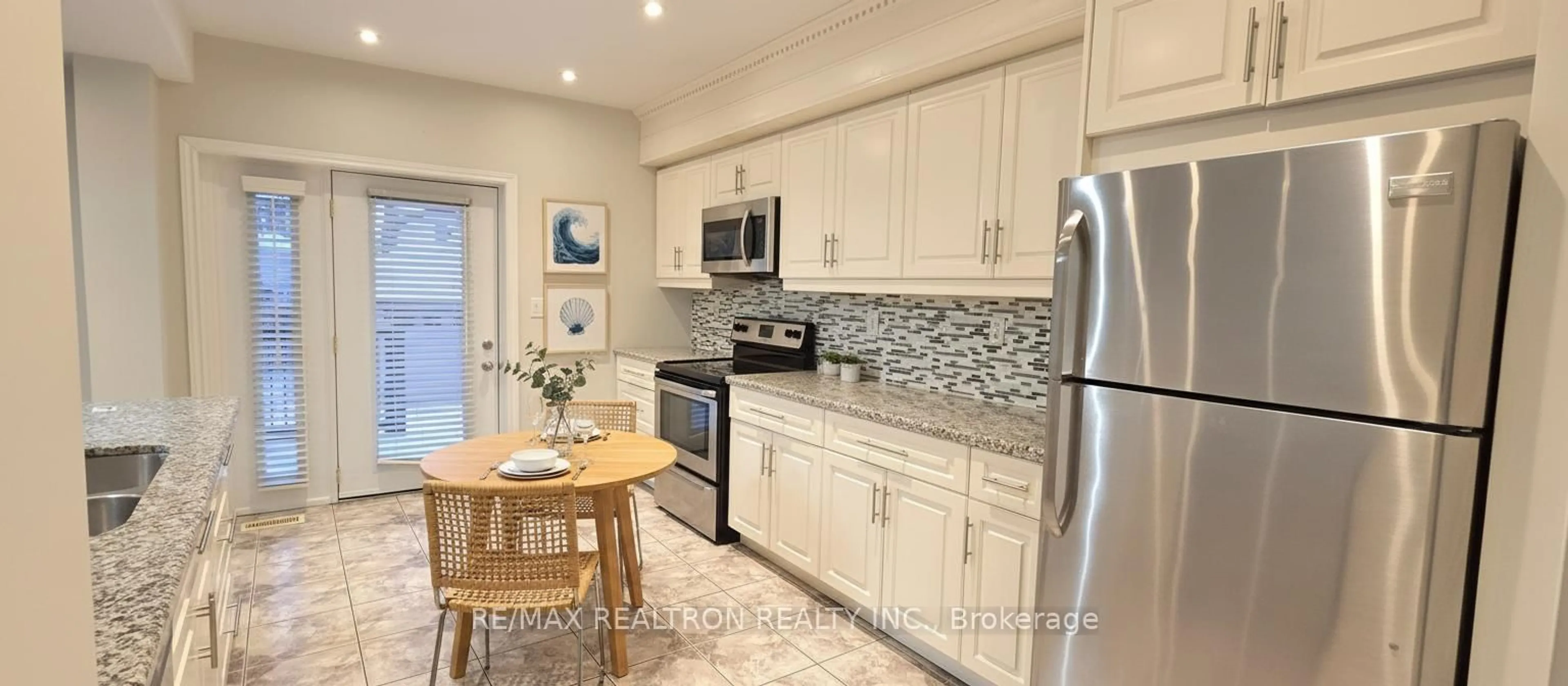 Open concept kitchen, ceramic/tile floor for 88 Kensington Ave, Hamilton Ontario L8L 7N2