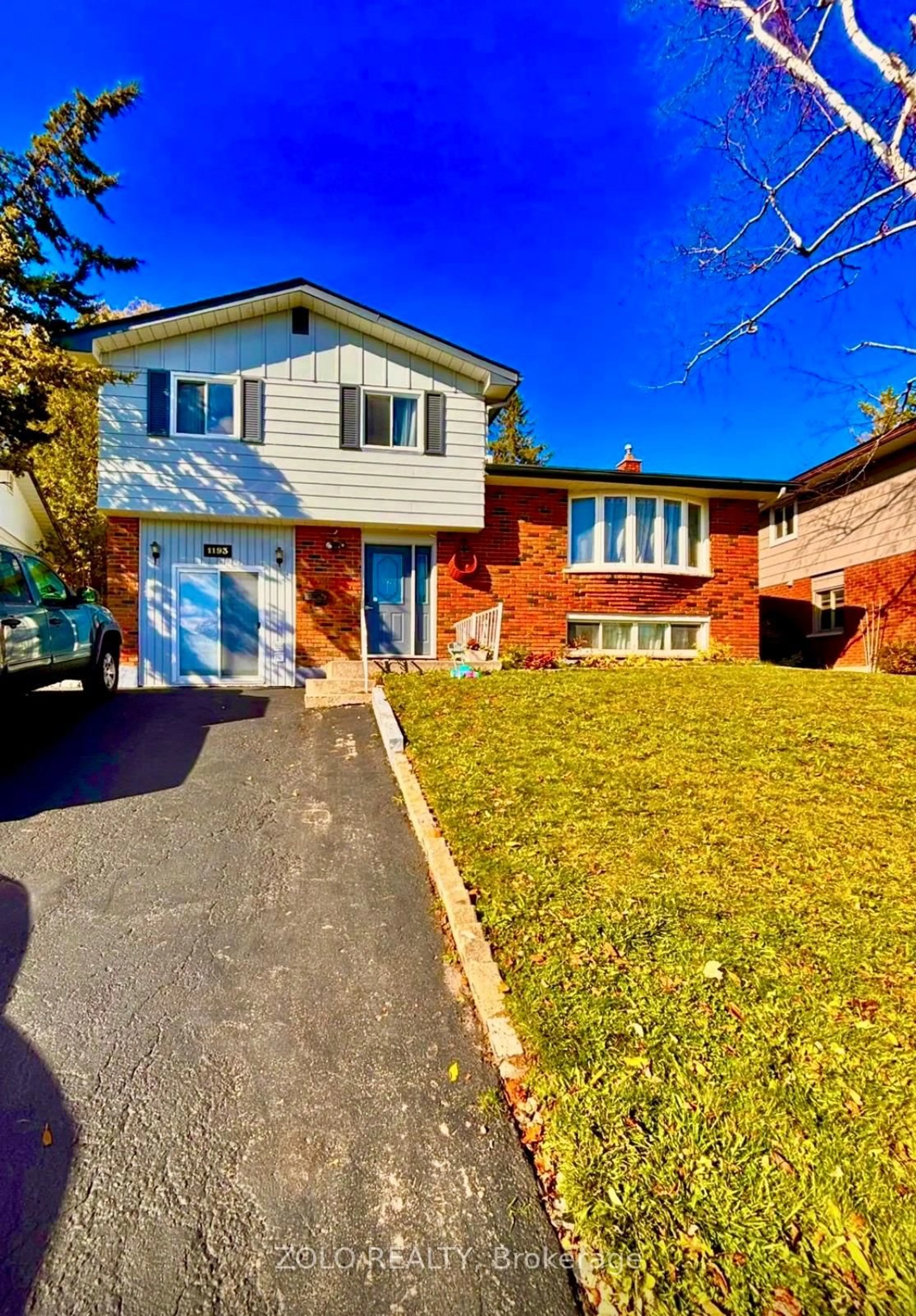 Home with brick exterior material, street for 1193 Cartier Blvd, Peterborough Ontario K9H 7B8