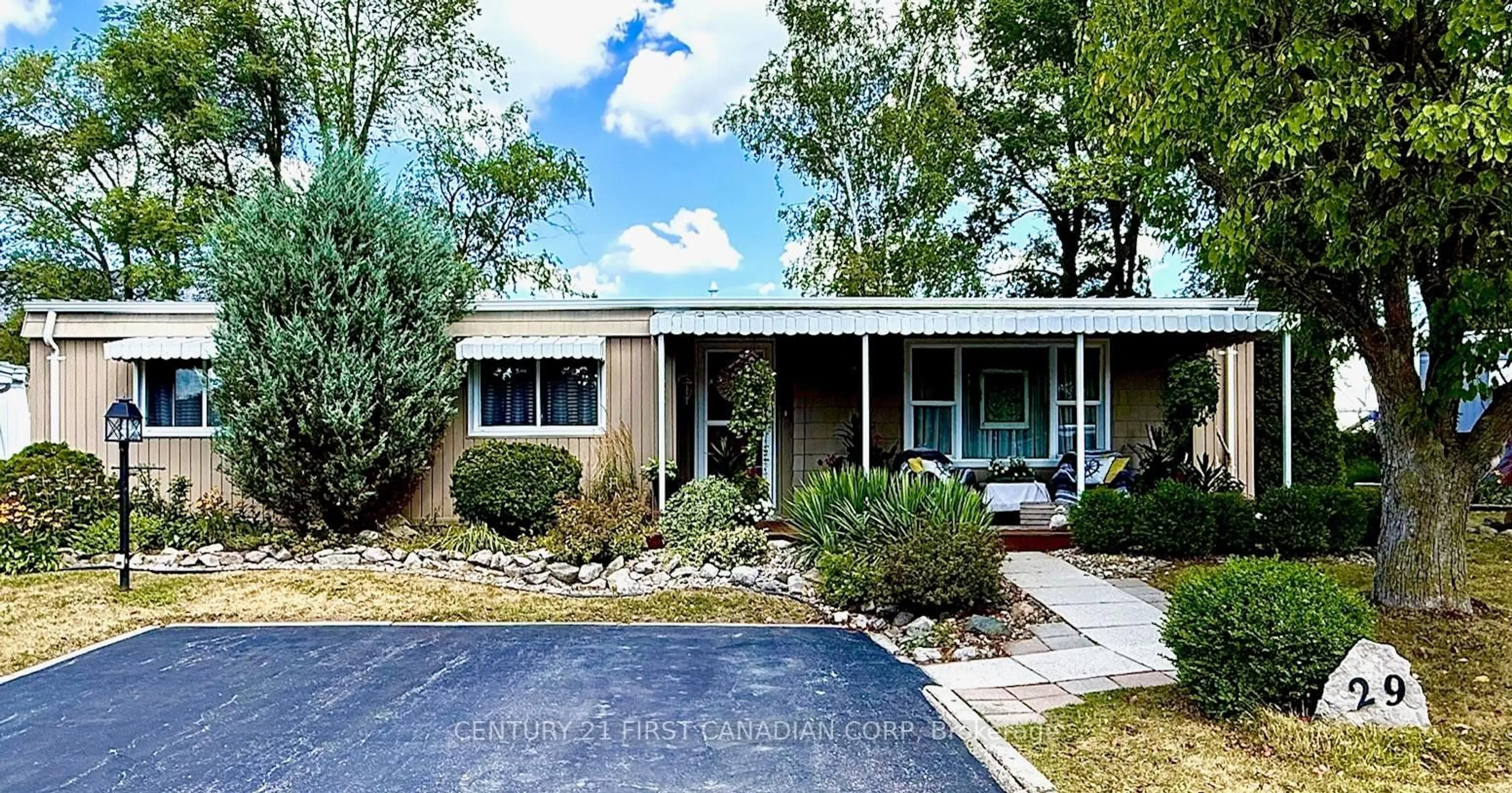 Home with vinyl exterior material, street for 29 Maple Grove Crt, South Huron Ontario N0M 1T0