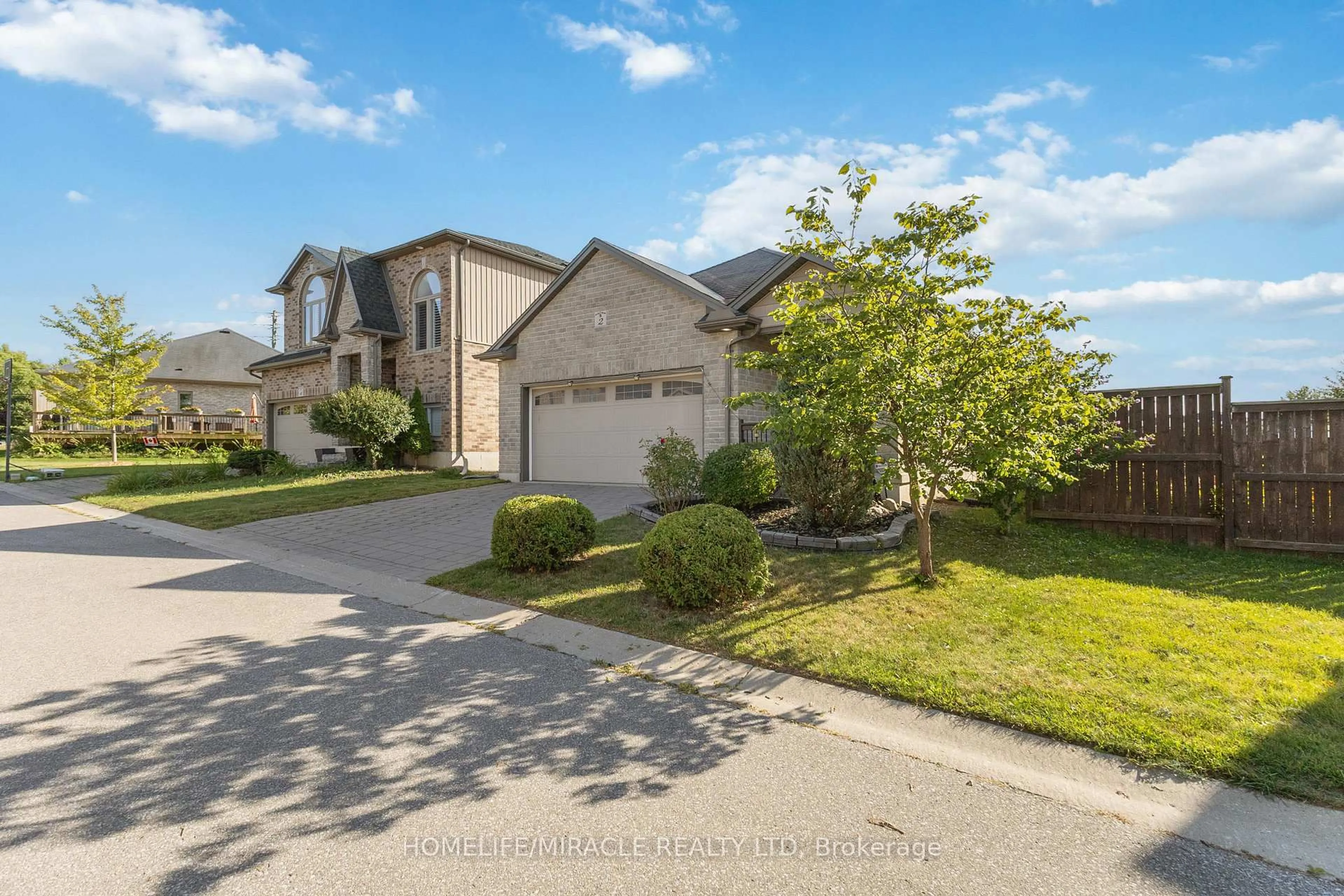 A pic from outside/outdoor area/front of a property/back of a property/a pic from drone, street for 70 Tanoak Dr #2, London North Ontario N6G 5R3