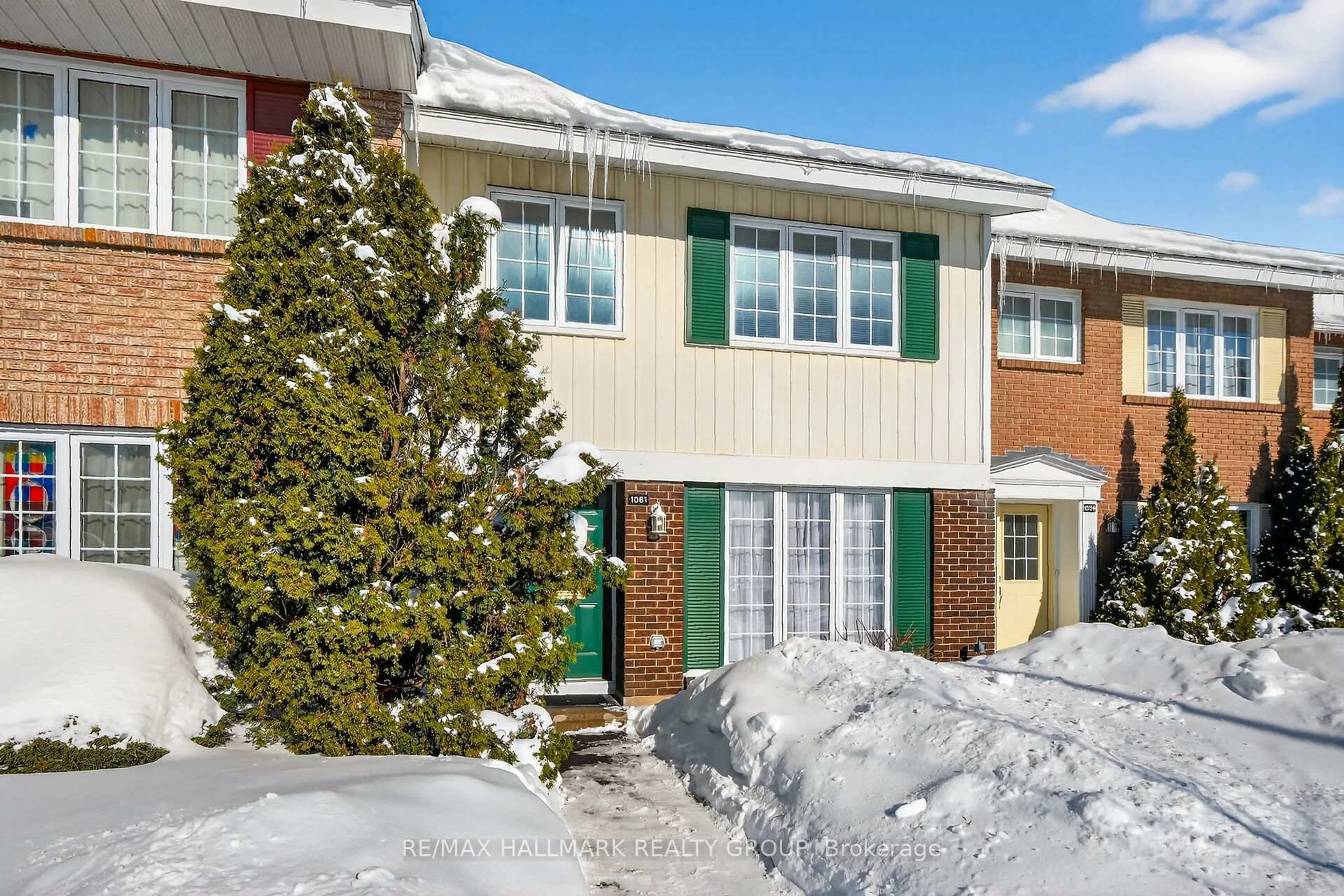 Home with brick exterior material, street for 1061 Meadowlands Dr #111, Ottawa Ontario K2C 0K5