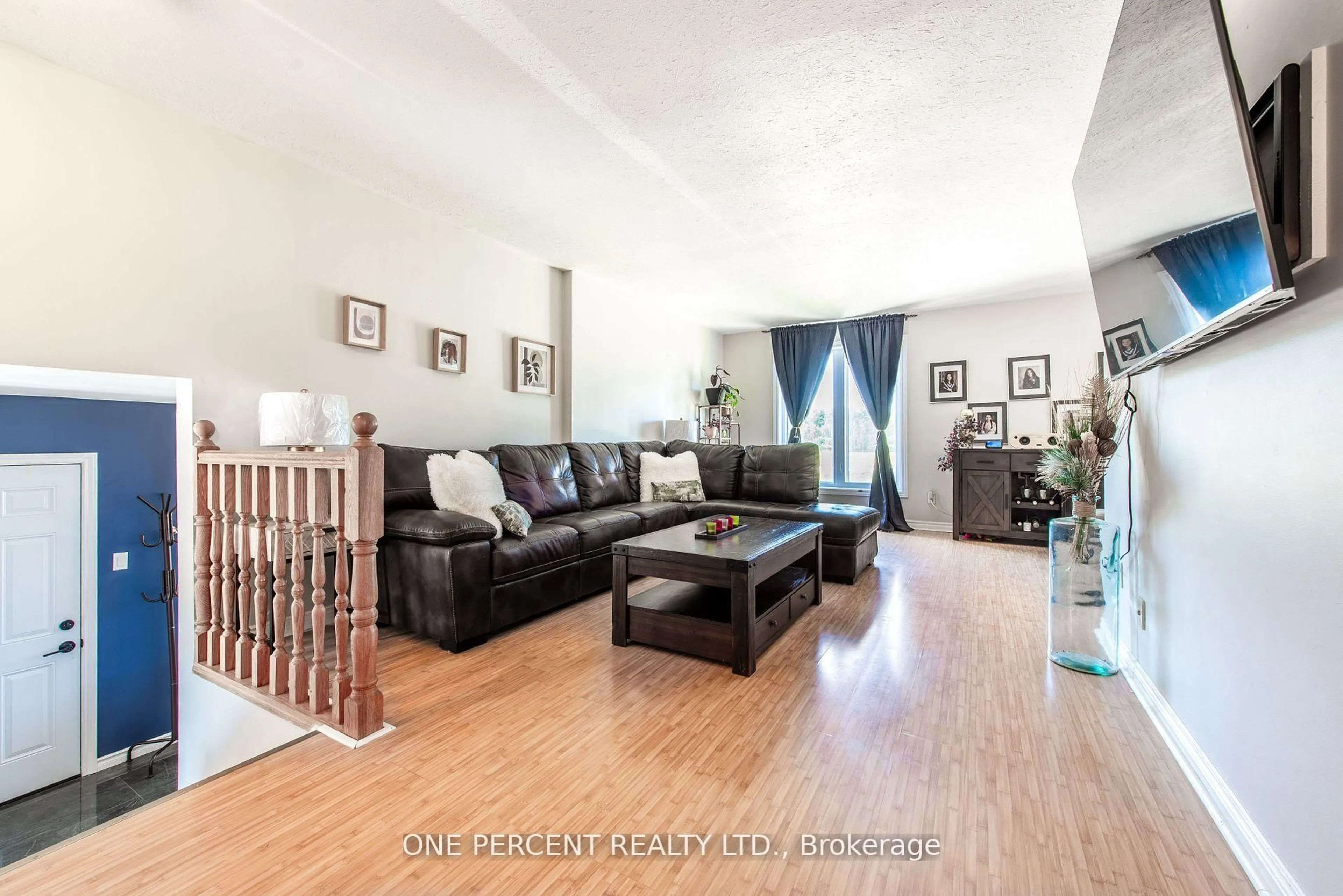 Living room with furniture, wood/laminate floor for 752809 Southgate 75 Sdrd, Southgate Ontario N0C 1L0