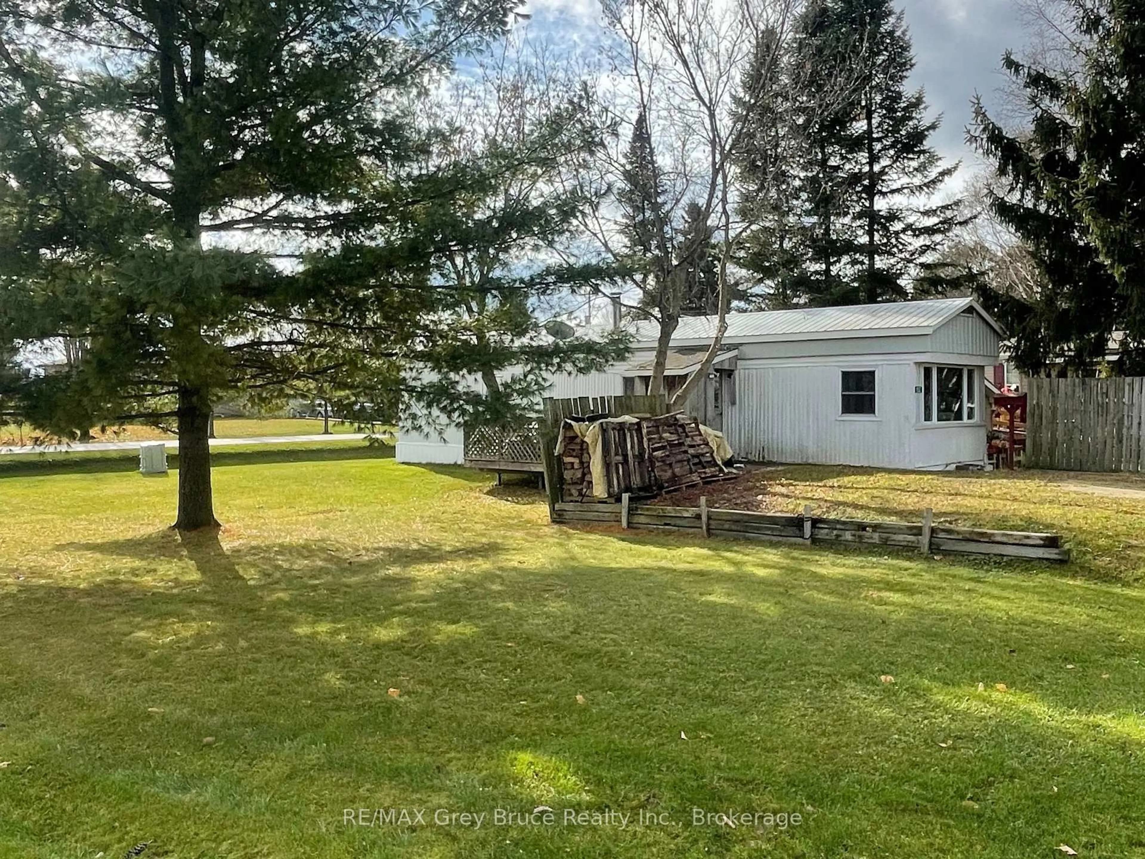 A pic from outside/outdoor area/front of a property/back of a property/a pic from drone, water/lake/river/ocean view for 102 Grace St, Georgian Bluffs Ontario N0H 2N0