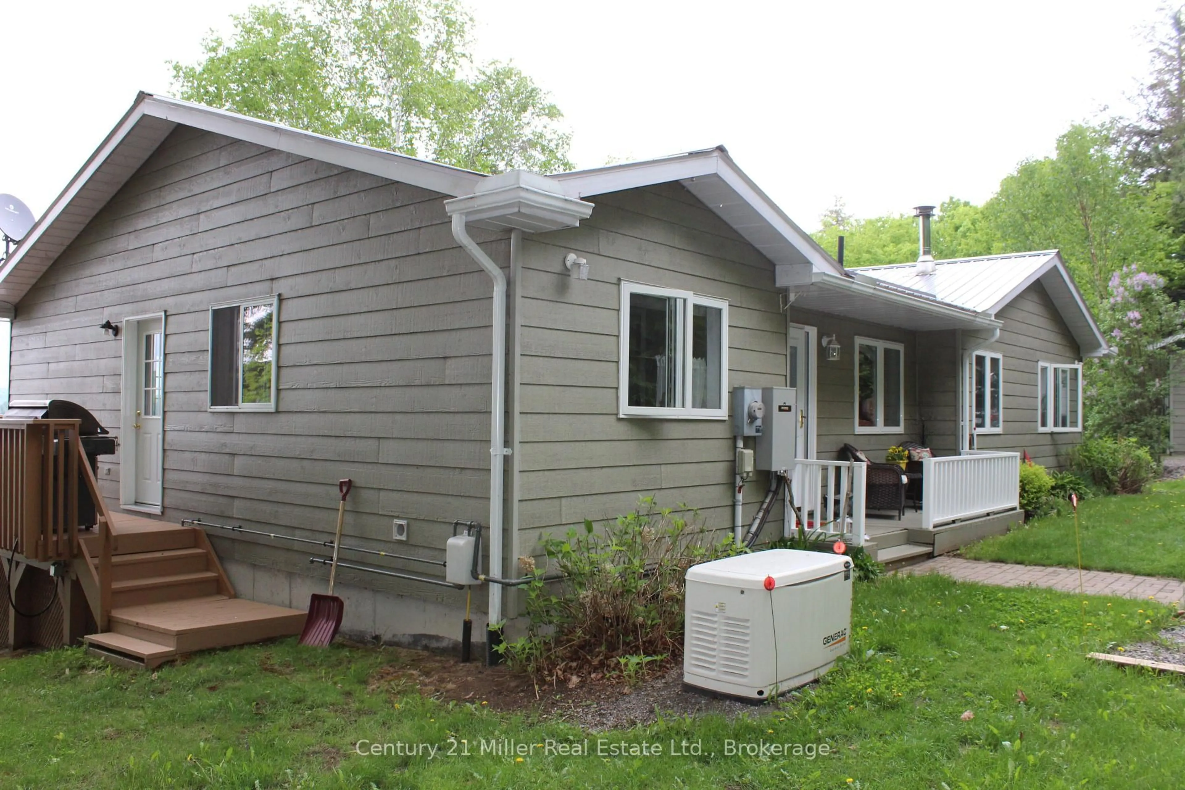 Home with vinyl exterior material, street for 994 Kamaniskeg Lake Rd, Combermere Ontario K0J 1L0