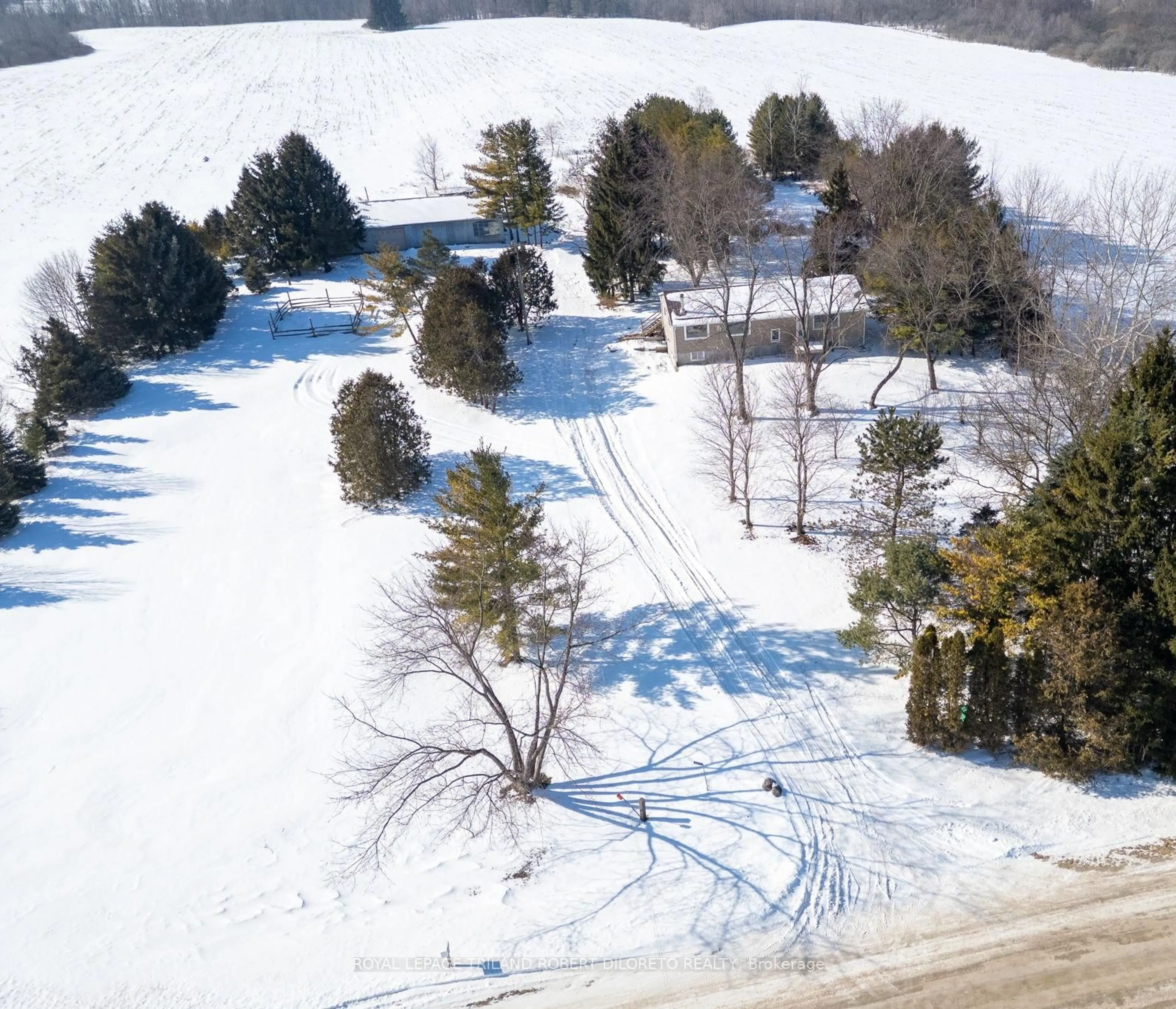 A pic from outside/outdoor area/front of a property/back of a property/a pic from drone, unknown for 21477 Springfield Rd, Southwest Middlesex Ontario N0L 1T0