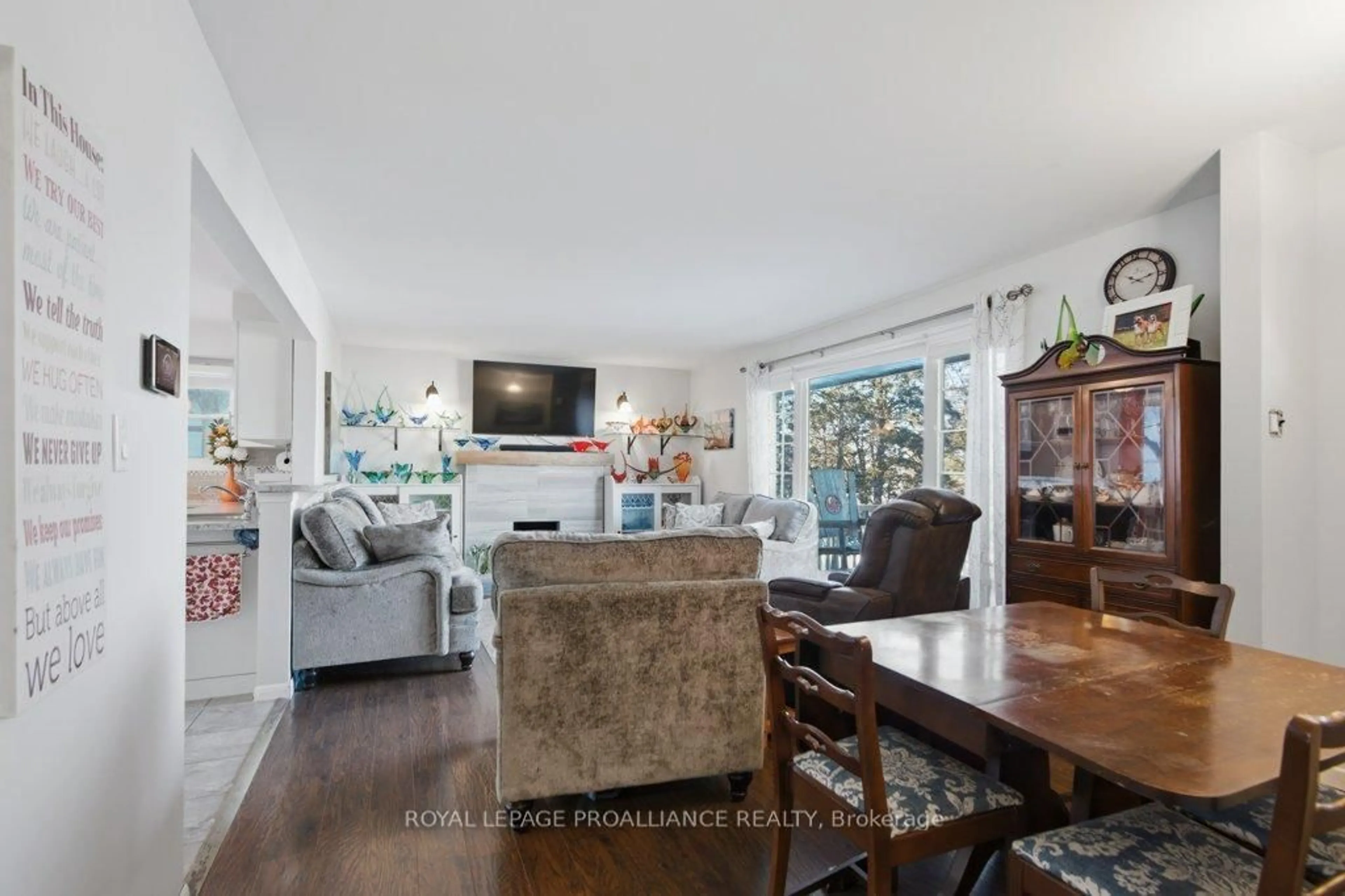 Living room with furniture, wood/laminate floor for 550 Frankford Stirling Rd, Hastings Ontario K0K 2C0