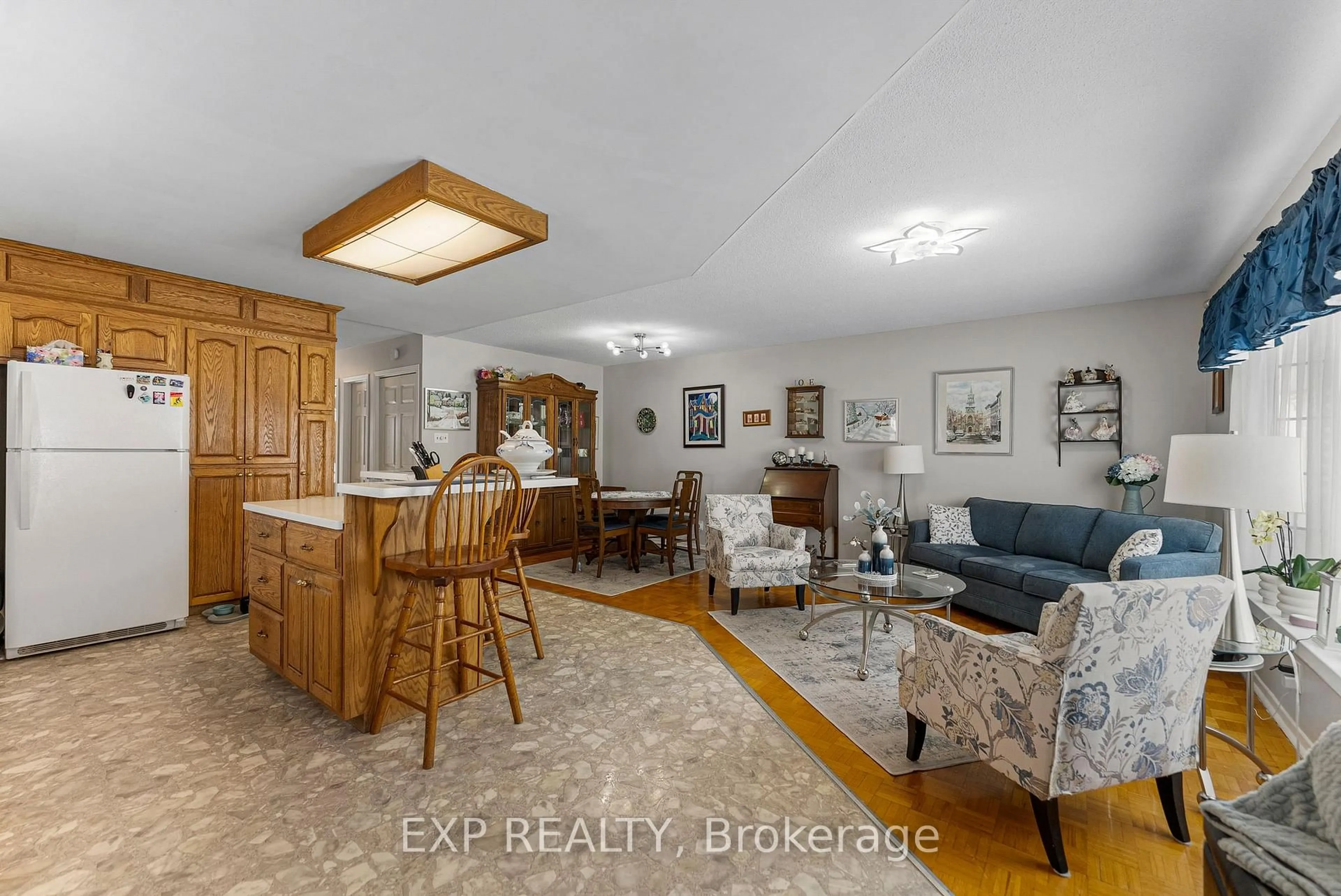 Living room with furniture, wood/laminate floor for 225 Airth Blvd, Renfrew Ontario K7V 4B8