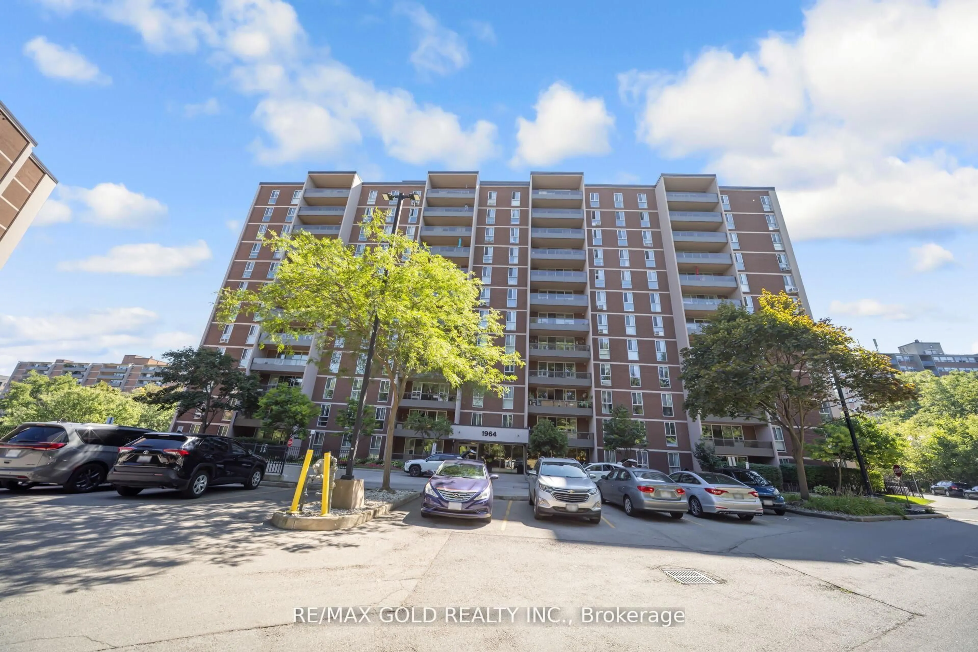 A pic from outside/outdoor area/front of a property/back of a property/a pic from drone, street for 1964 Main St #404, Hamilton Ontario L8S 0E9