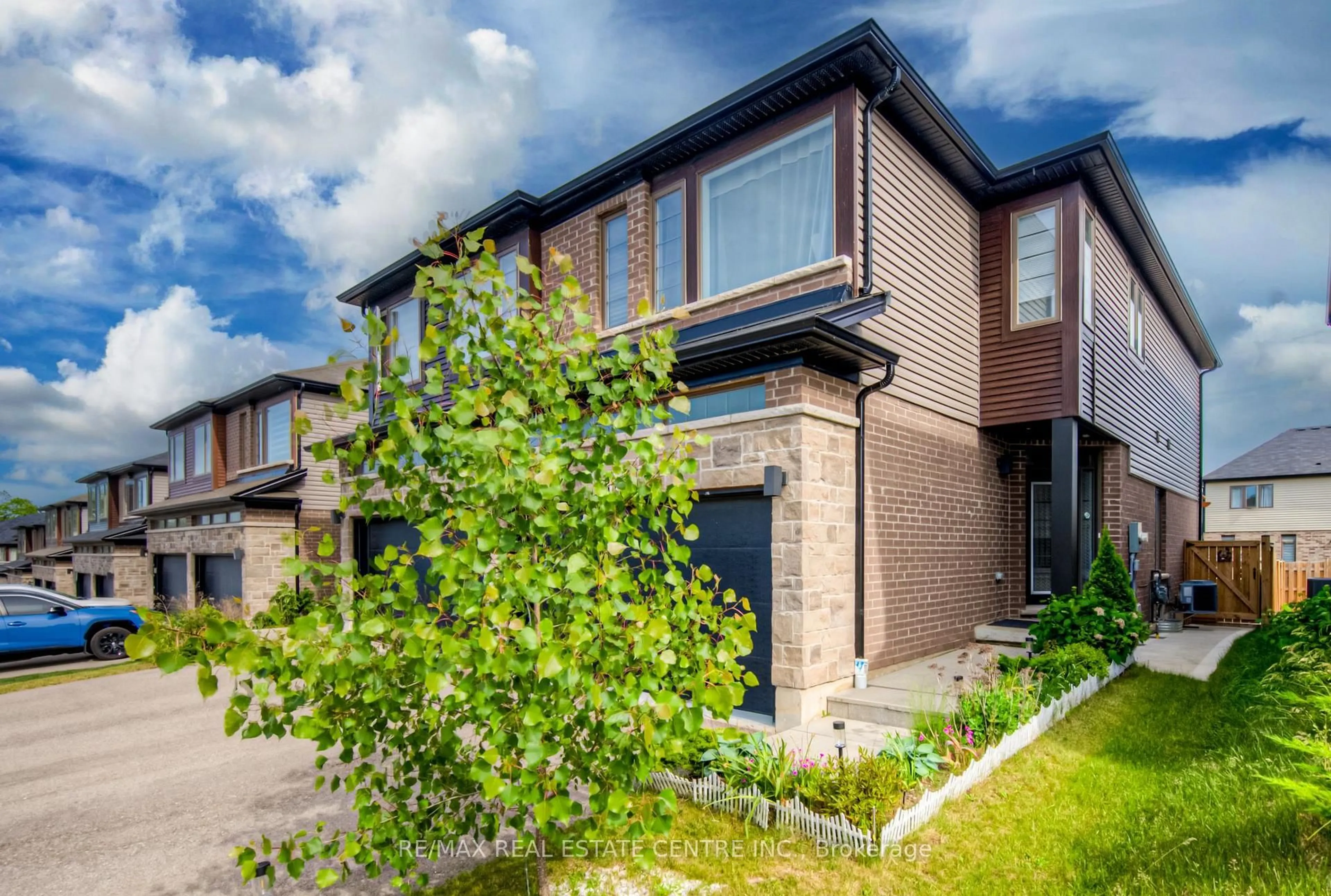 Home with brick exterior material, street for 19 Baker Lane, Brant Ontario N3L 0K3