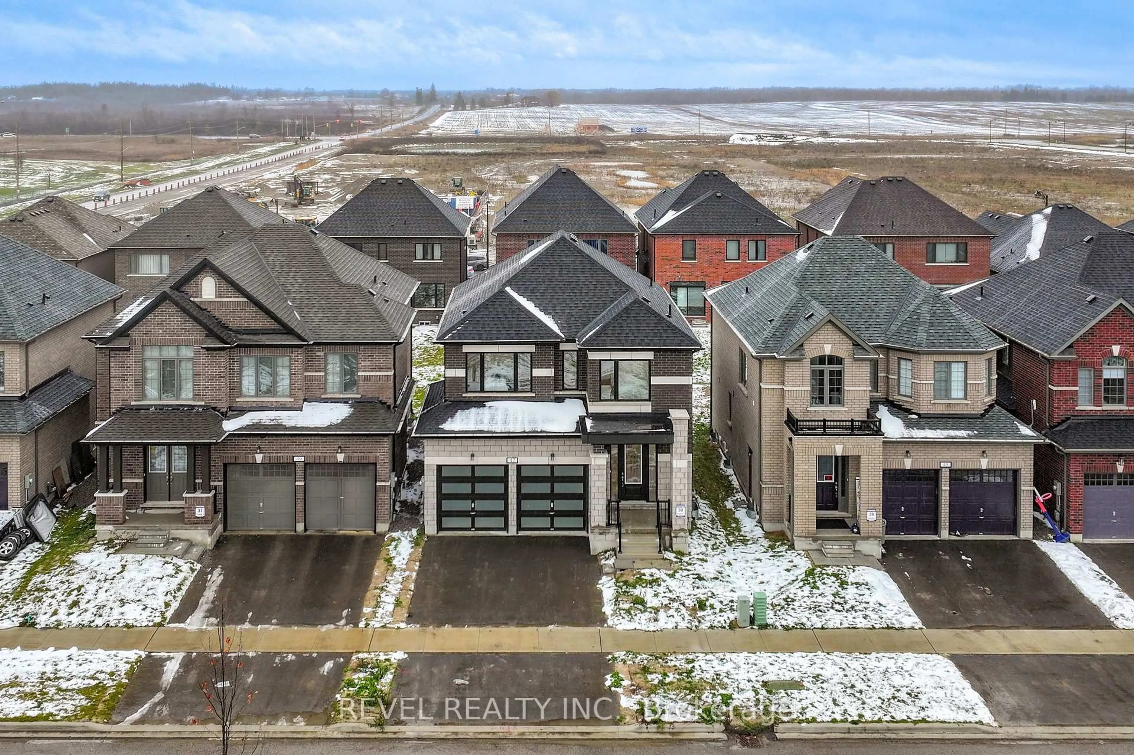 A pic from outside/outdoor area/front of a property/back of a property/a pic from drone, mountain view for 47 Corley St, Kawartha Lakes Ontario K9V 6C2