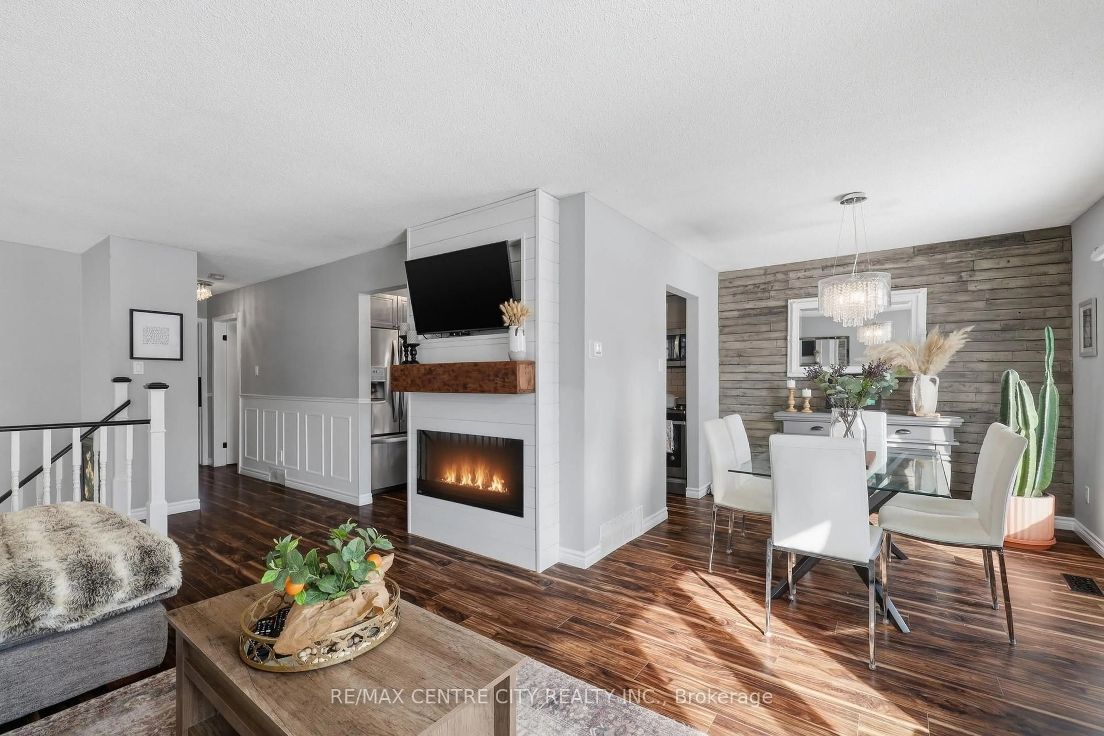 Open concept kitchen, wood/laminate floor for 50 Patience Cres, London South Ontario N6E 2K9