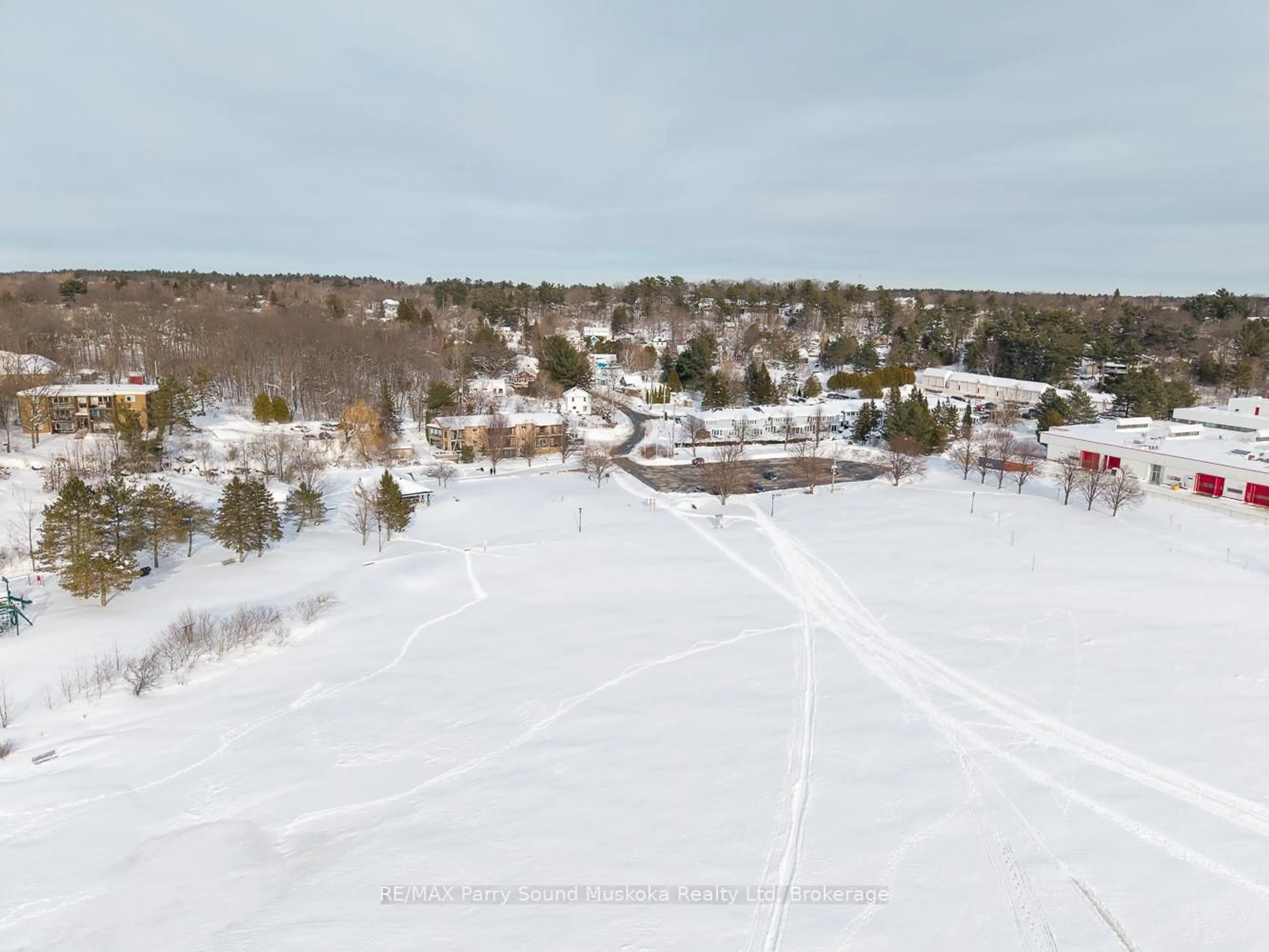 A pic from outside/outdoor area/front of a property/back of a property/a pic from drone, street for 1 Georgian Bay Ave #12, Parry Sound Ontario P2A 3B1