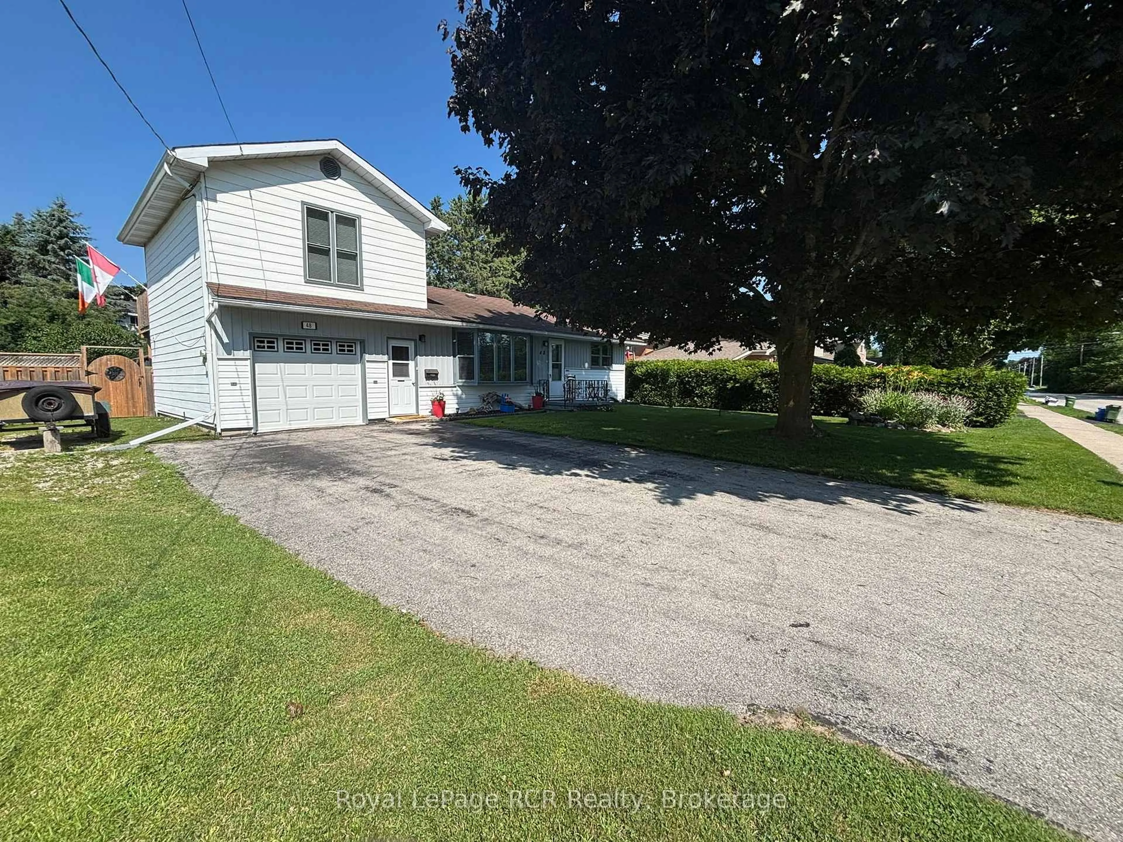 A pic from outside/outdoor area/front of a property/back of a property/a pic from drone, street for 48 4th Ave, Owen Sound Ontario N4K 4V2