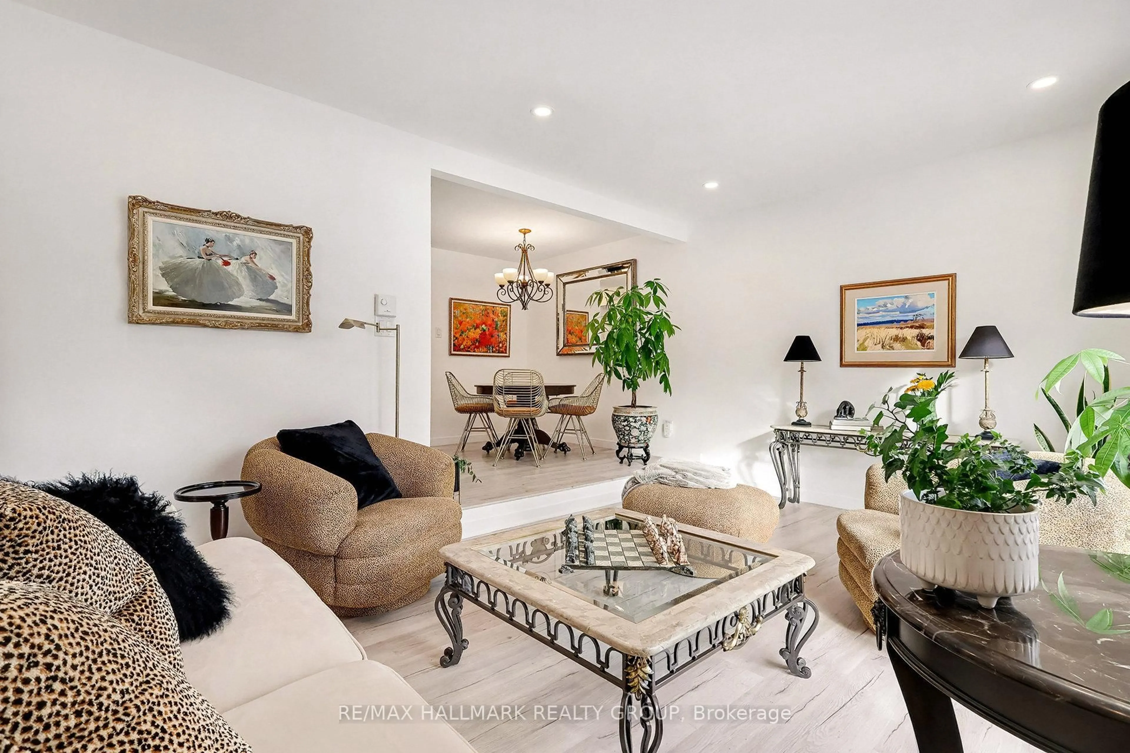 Living room with furniture, ceramic/tile floor for 6861 Bilberry Dr, Ottawa Ontario K1C 2E8