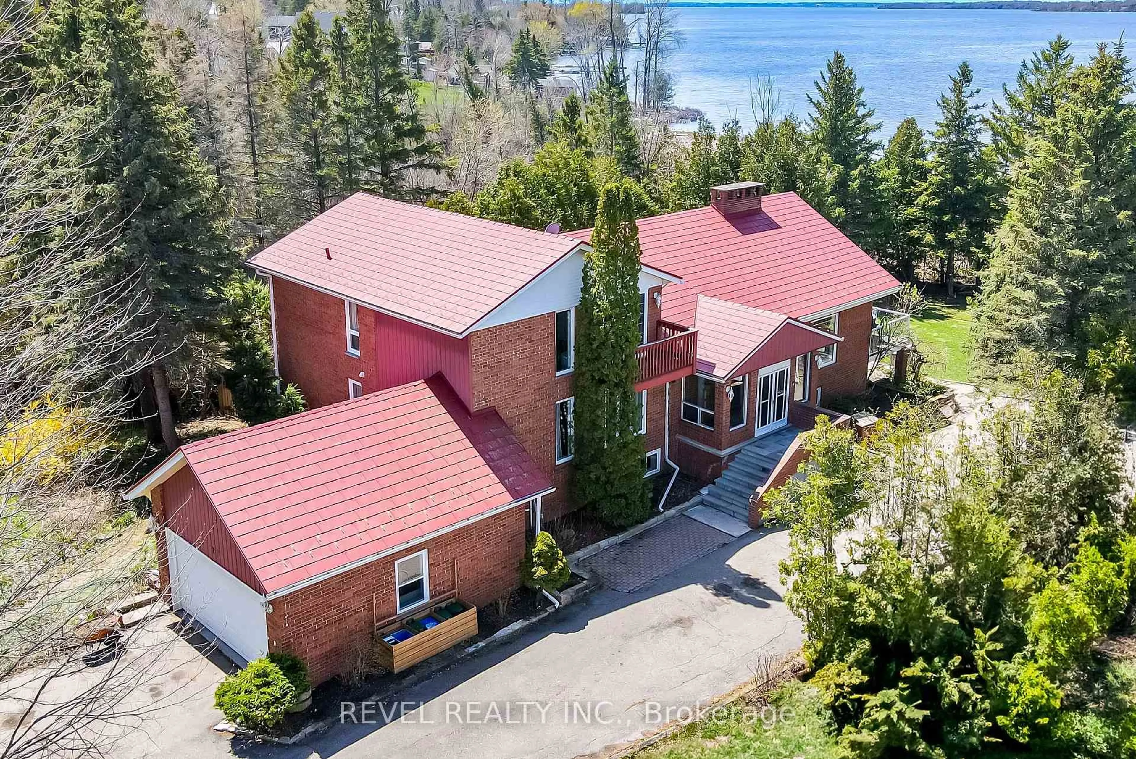 A pic from outside/outdoor area/front of a property/back of a property/a pic from drone, water/lake/river/ocean view for 27 Cedar Cres, Kawartha Lakes Ontario L0B 1K0