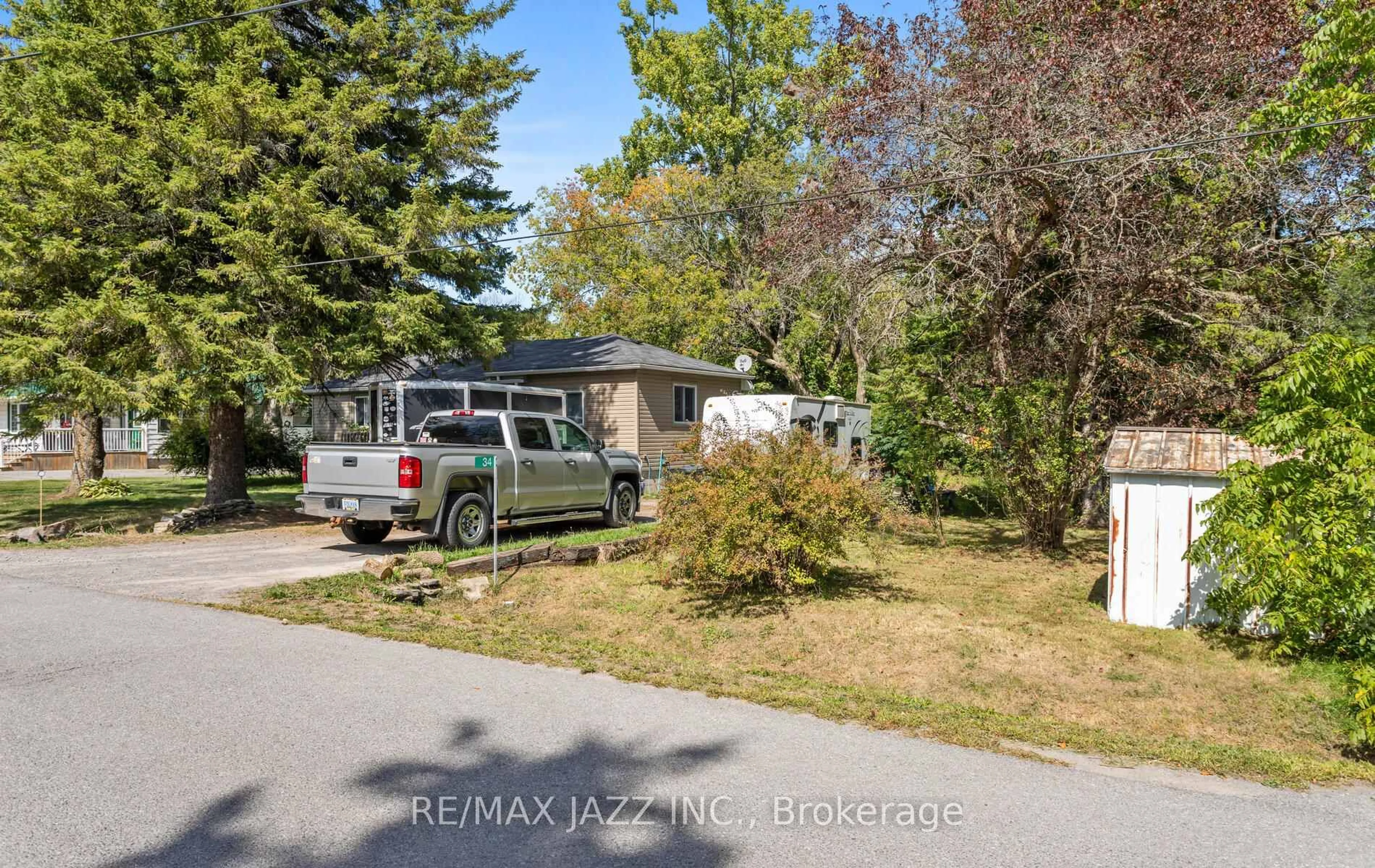 A pic from outside/outdoor area/front of a property/back of a property/a pic from drone, street for 34 Fawcette Ave, Prince Edward County Ontario K0K 2T0