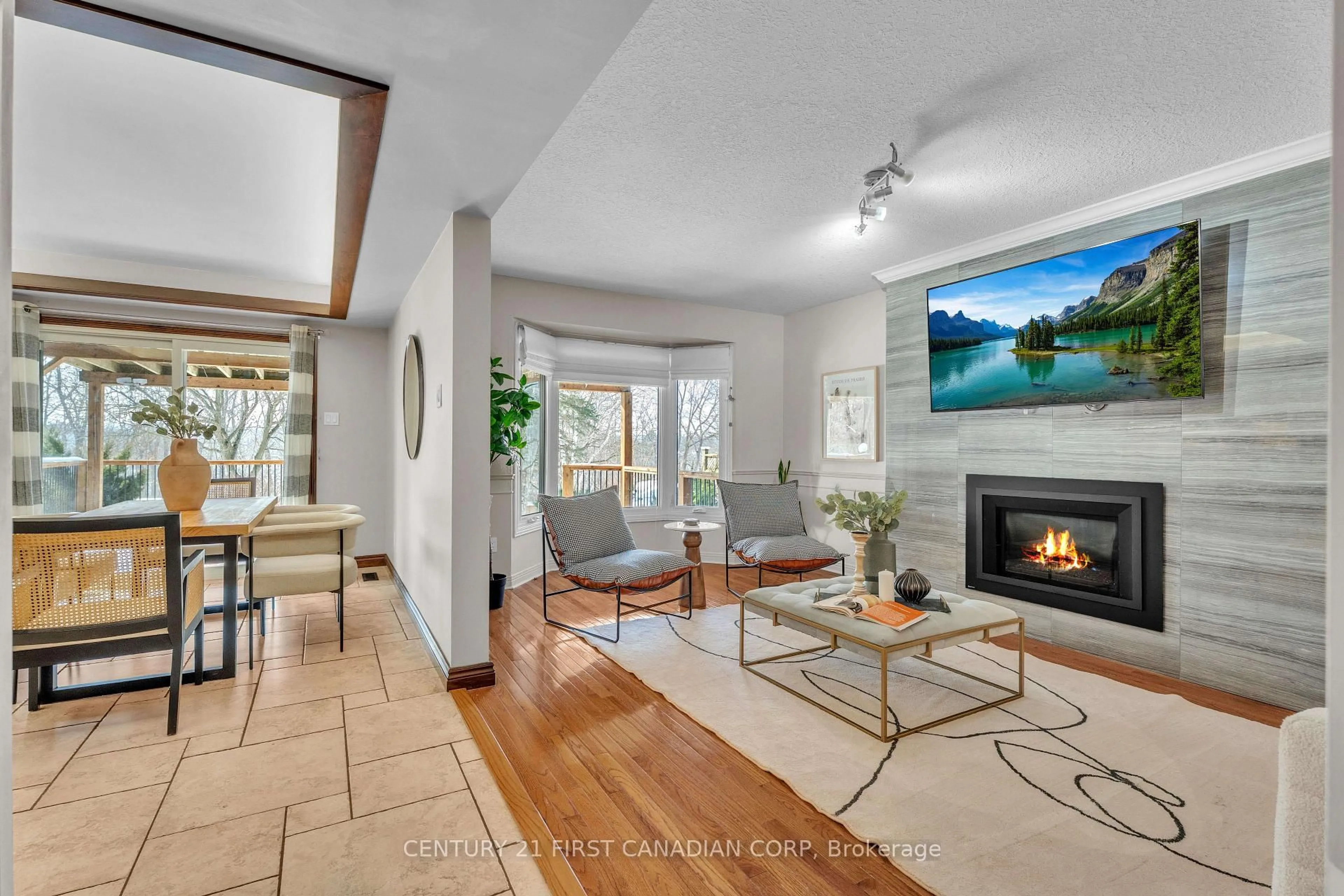 Living room with furniture, ceramic/tile floor for 63 Chalfont Rd, London North Ontario N6H 4Y5