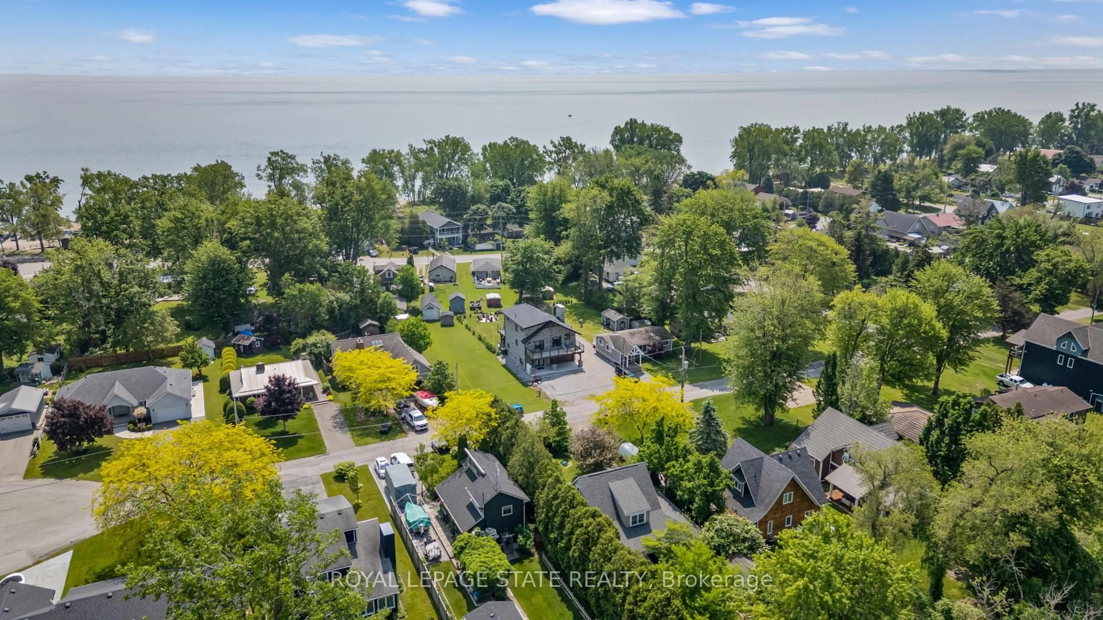 A pic from outside/outdoor area/front of a property/back of a property/a pic from drone, water/lake/river/ocean view for 12 Park Lane Cres, Norfolk Ontario N0E 1T0