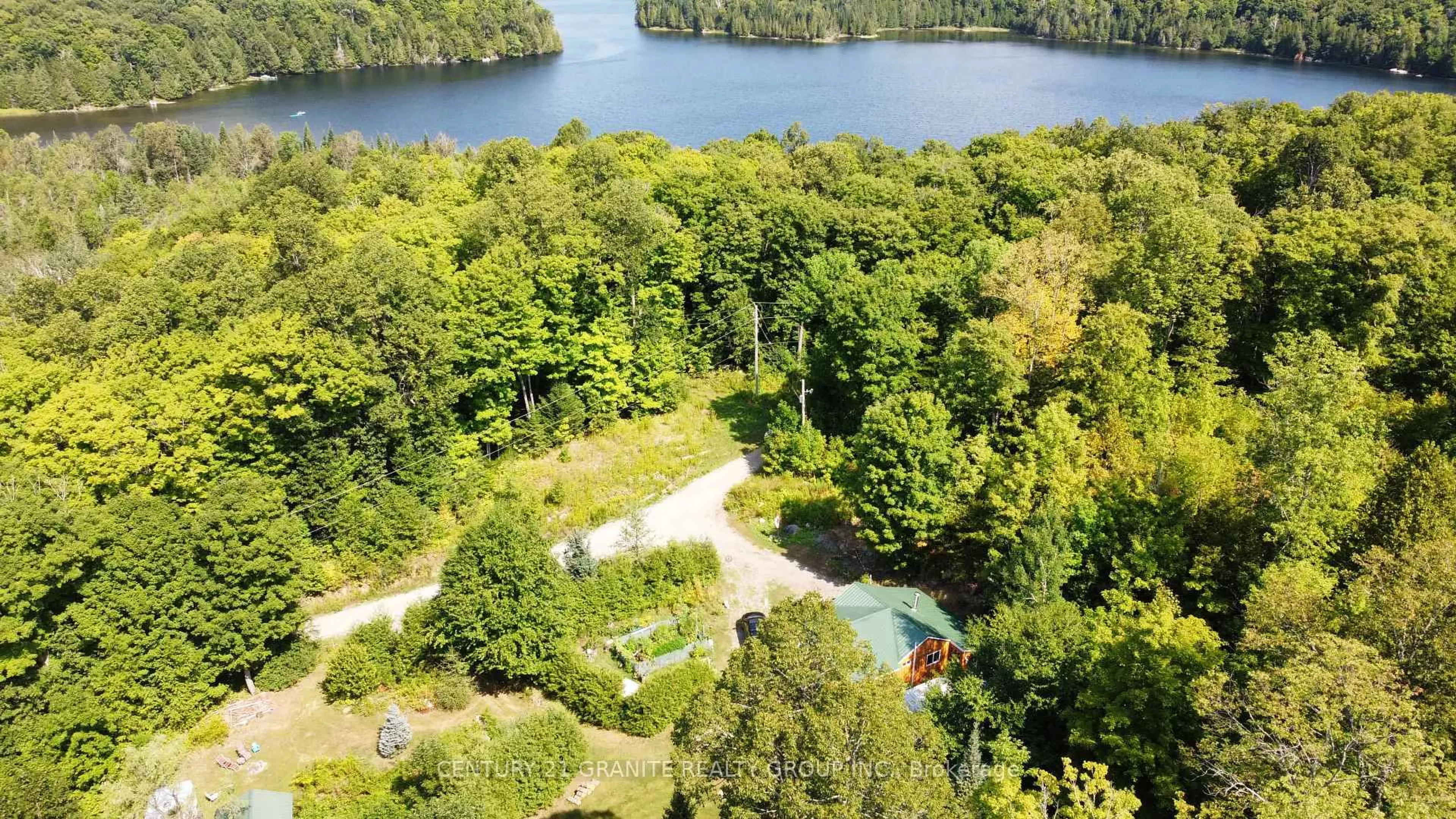 A pic from outside/outdoor area/front of a property/back of a property/a pic from drone, water/lake/river/ocean view for 261A Copeland Lake Rd, Denbigh Ontario K0H 1L0